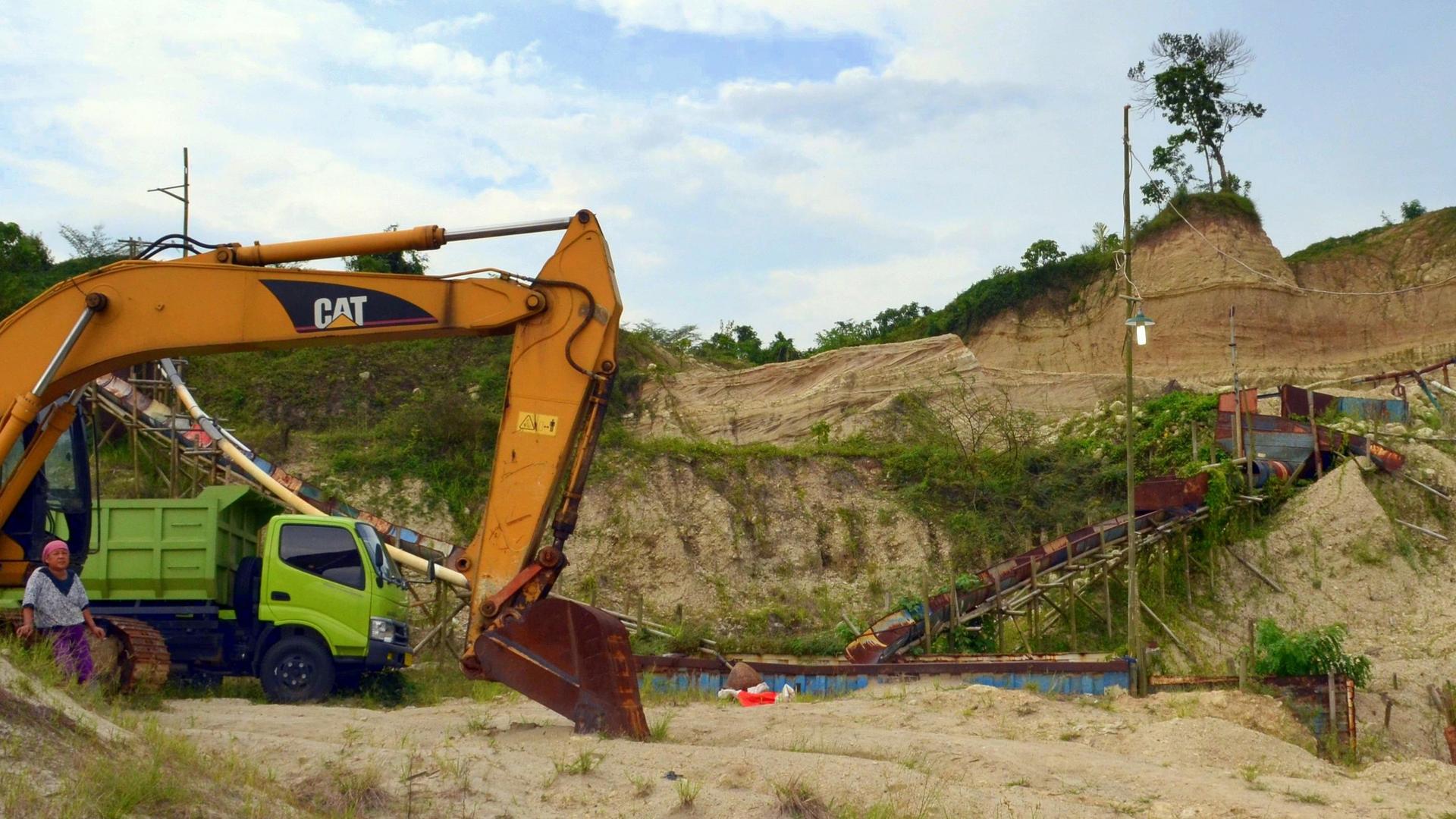 A sand mining operation in Rangkasbitung, Indonesia. A global building boom has driven soaring demand for sand for concrete and land reclamation, much of it illegal and damaging to ecosystems and communities.