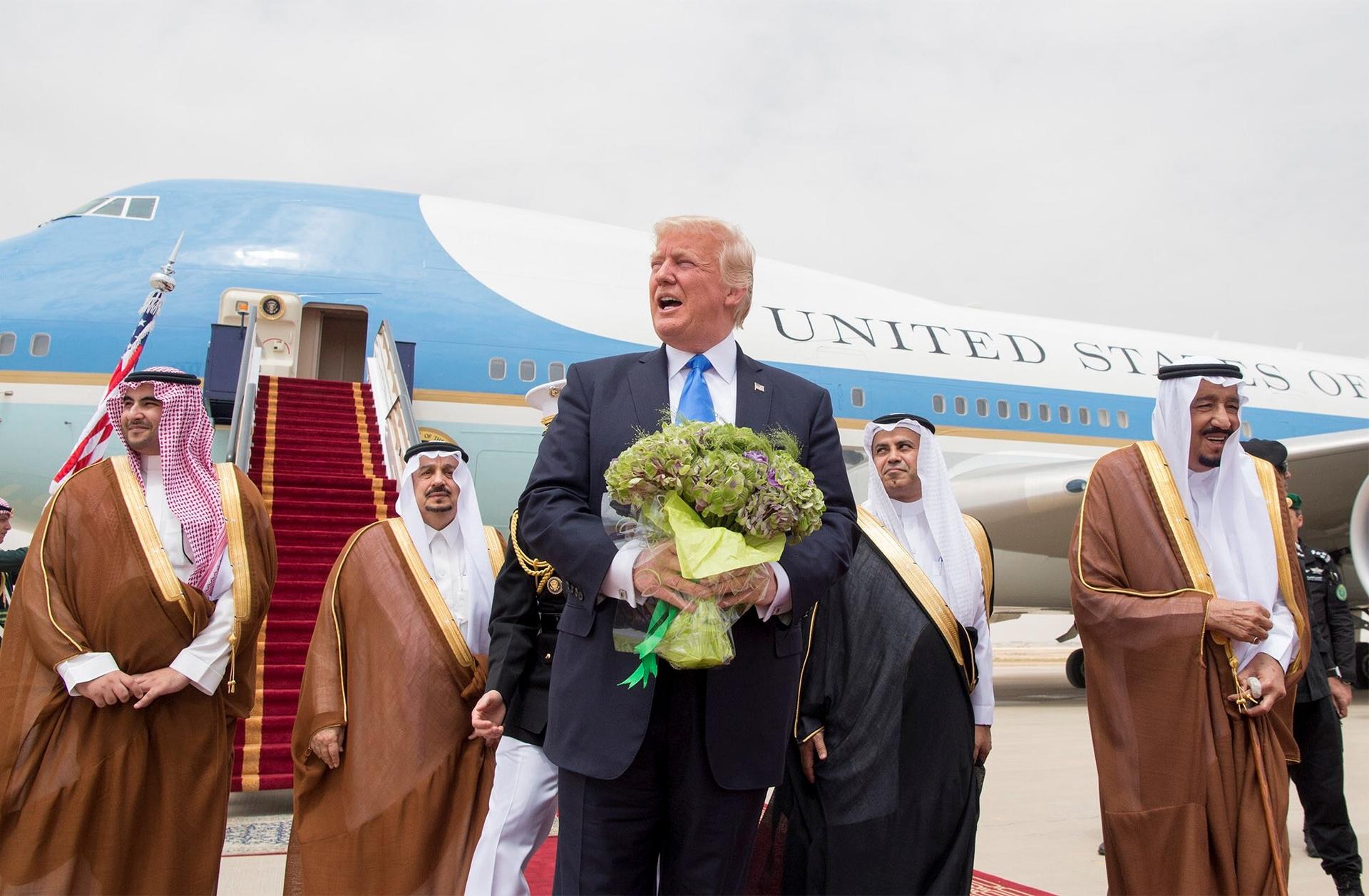 President Donald Trump is received in Riyadh by Saudi Arabia's King Salman bin Abdulaziz al-Saud, right, May 20, 2017