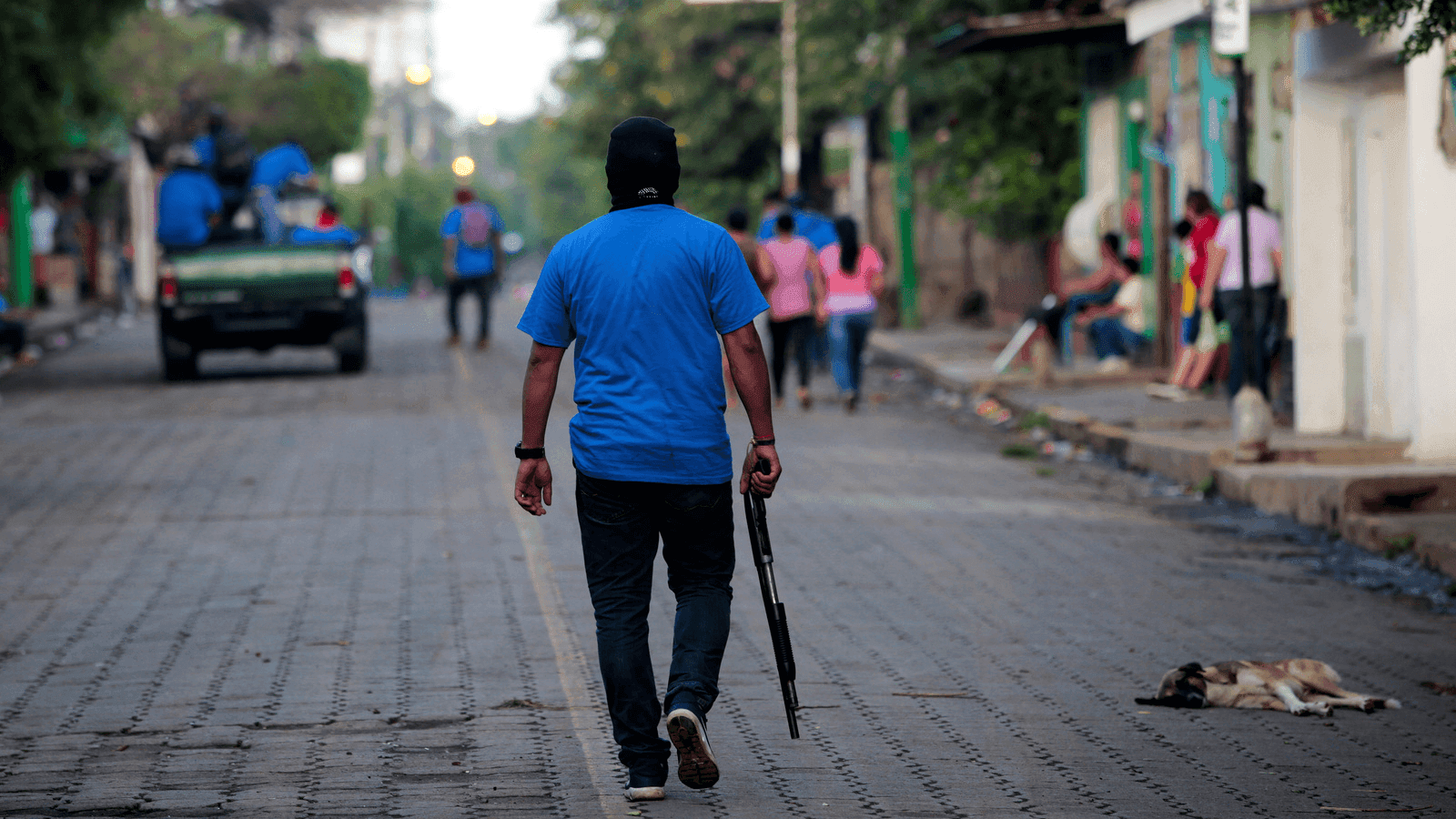 armed  government paramilitary man in the streets of Nicaragua 