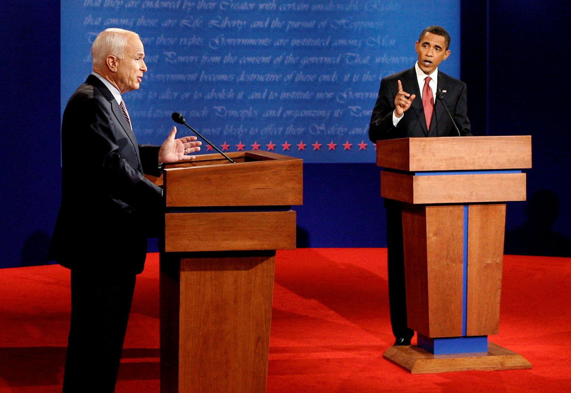 US Republican presidential candidate John McCain (L) and US Democratic presidential candidate Barack Obama (R) take part in their first 2008 US presidential debate