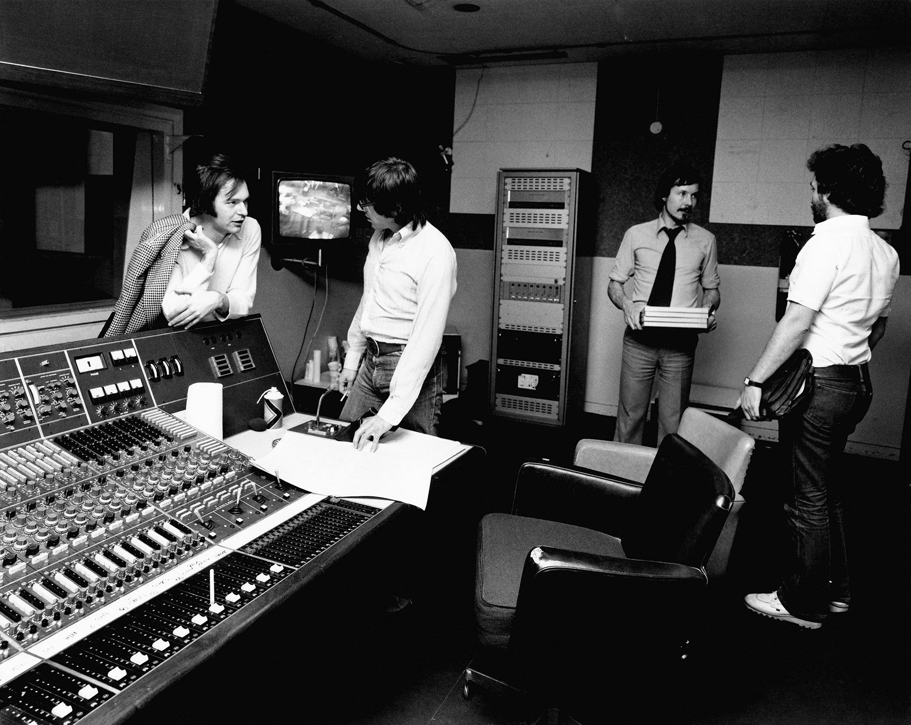 KPM employees including composer Keith Mansfield (second from left) in the control room.