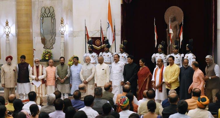 PM Modi and all of his ministers, who are all men with the exception of one woman