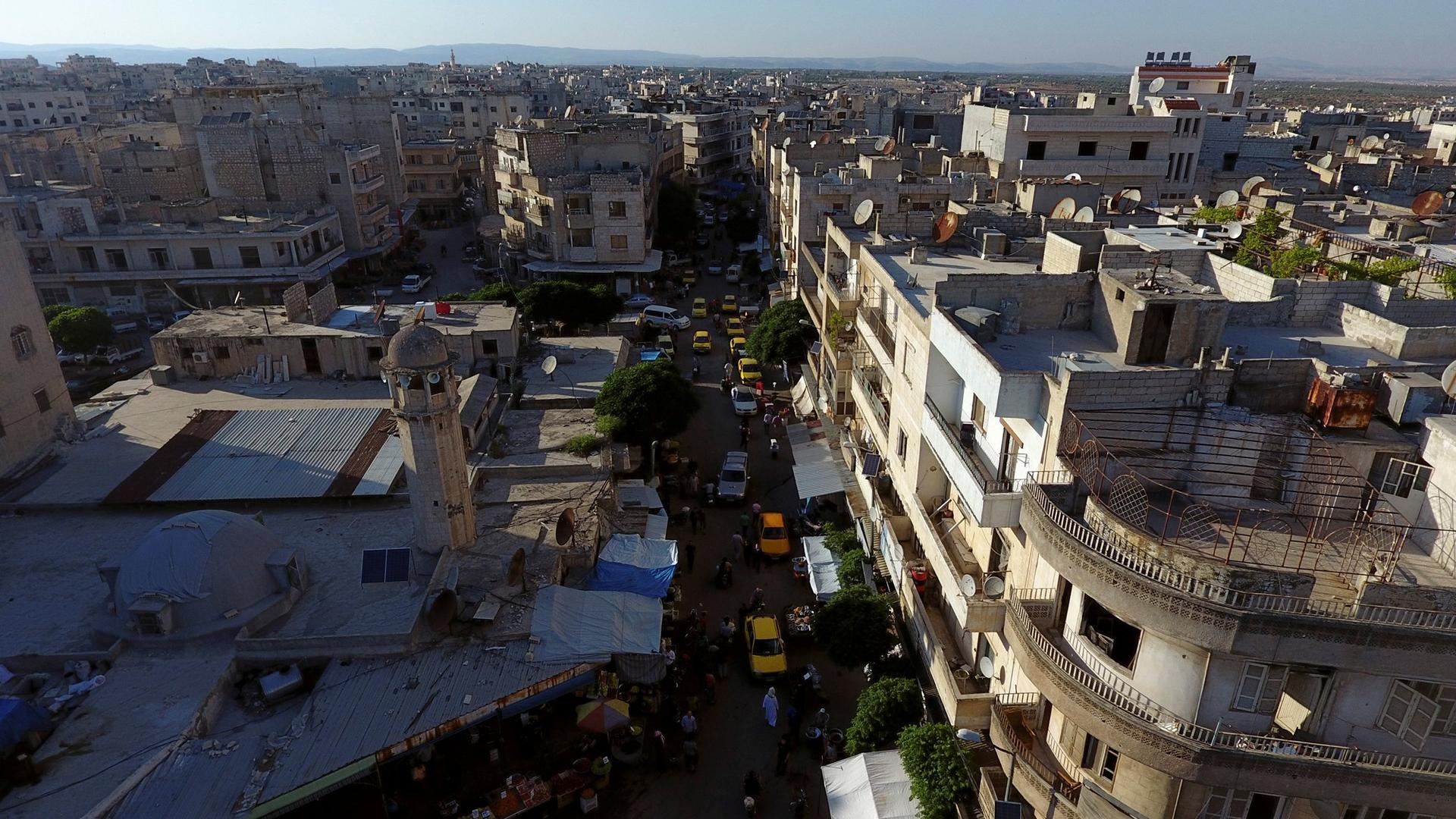 A street filled with cars in the rebel-held Idlib city, Syria, shown from above on June 8, 2017. 
