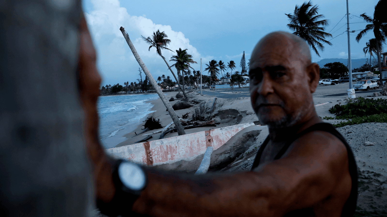 a man on a battered beach in puerto rico