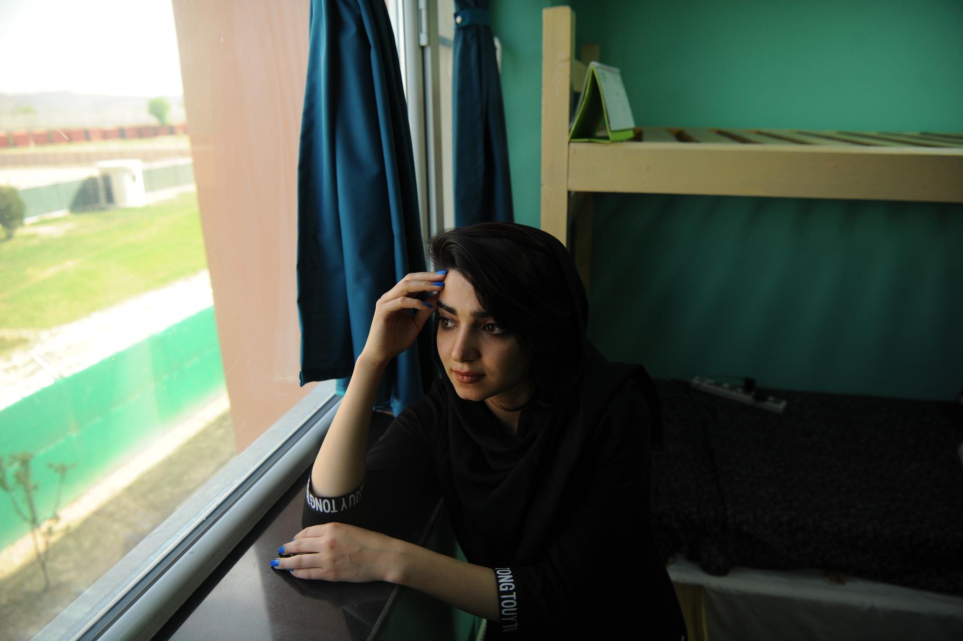 Samaneh Nasiri, a student at the American University of Afghanistan in her dorm room. Nasiri survived an attack on the school in 2016.