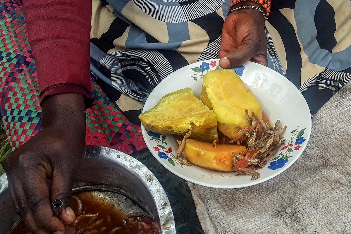 Betty Nabiteeko teaches mothers how to prepare favorite local dishes using the orange-fleshed sweet potato