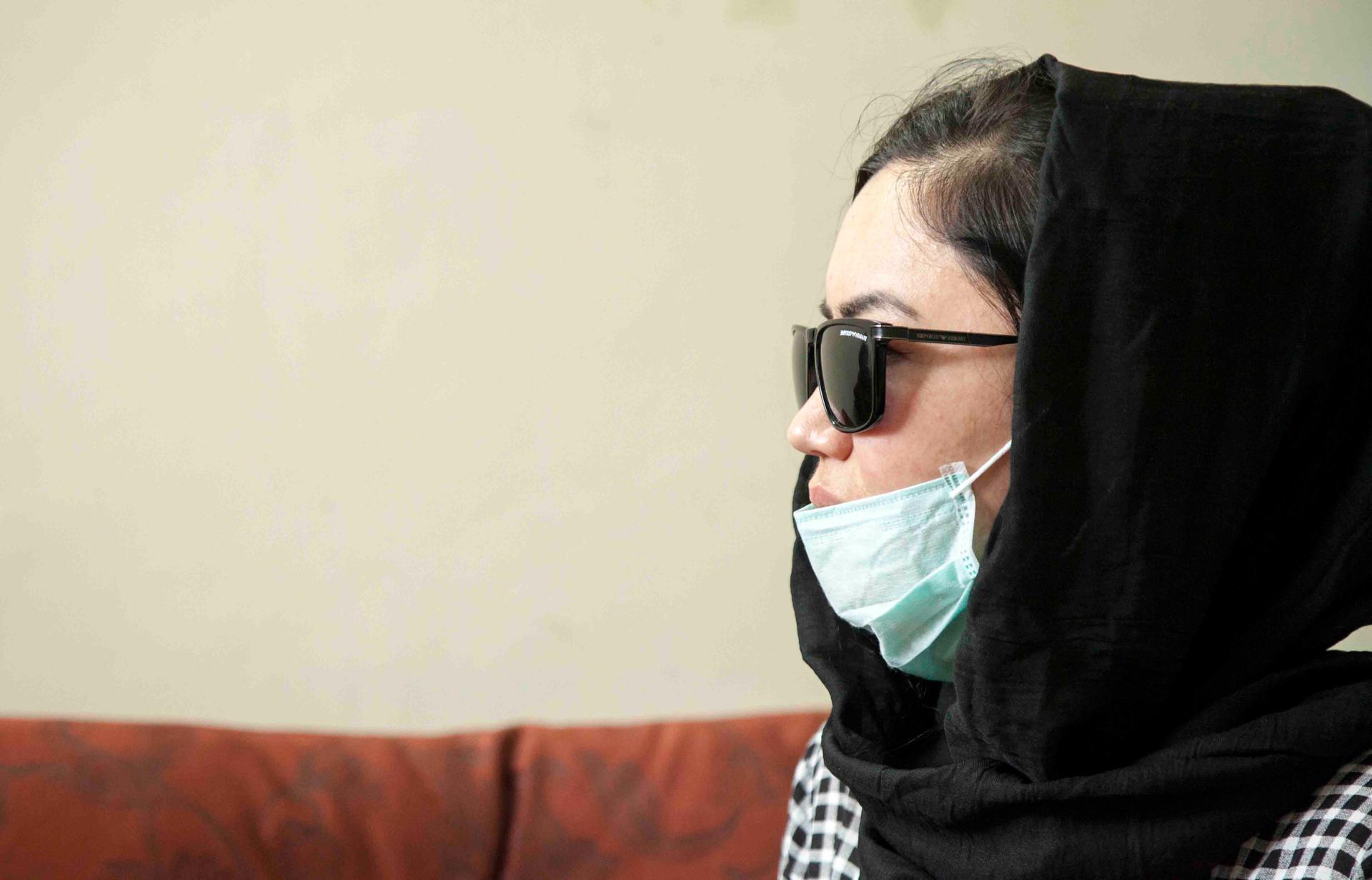 Zahra, a Hazara, at Dr. Zalmai Khan Ahmadzai's clinic in Kabul. She says she wants to get a nose job.