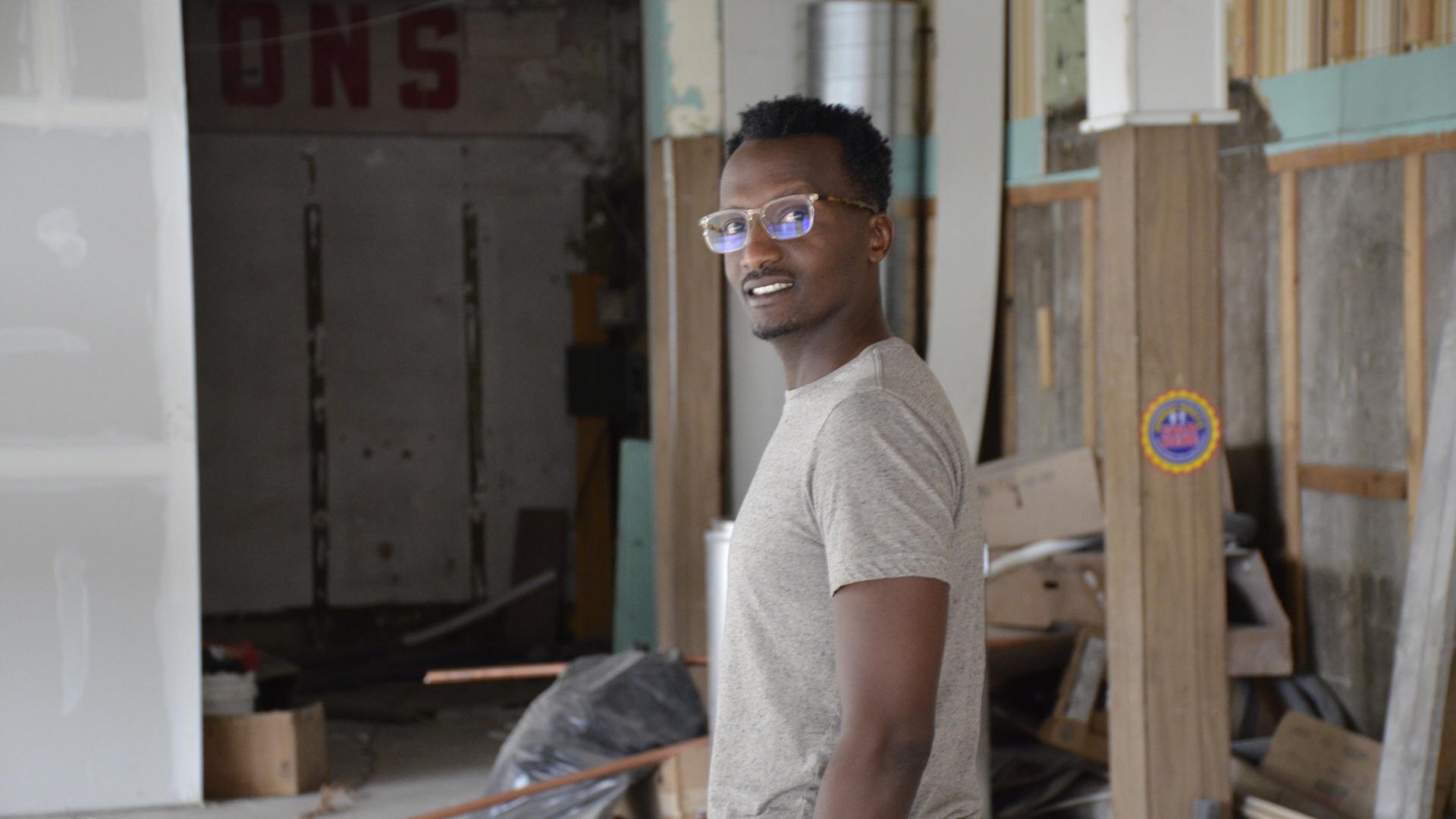 Hamissi Mamba walks through the guts of what will be his new restaurant, Baobab Fare in Detroit. Originally from Burundi, Mamba relocated to Michigan two years back, learned English, and is now a budding entrepreneur. 