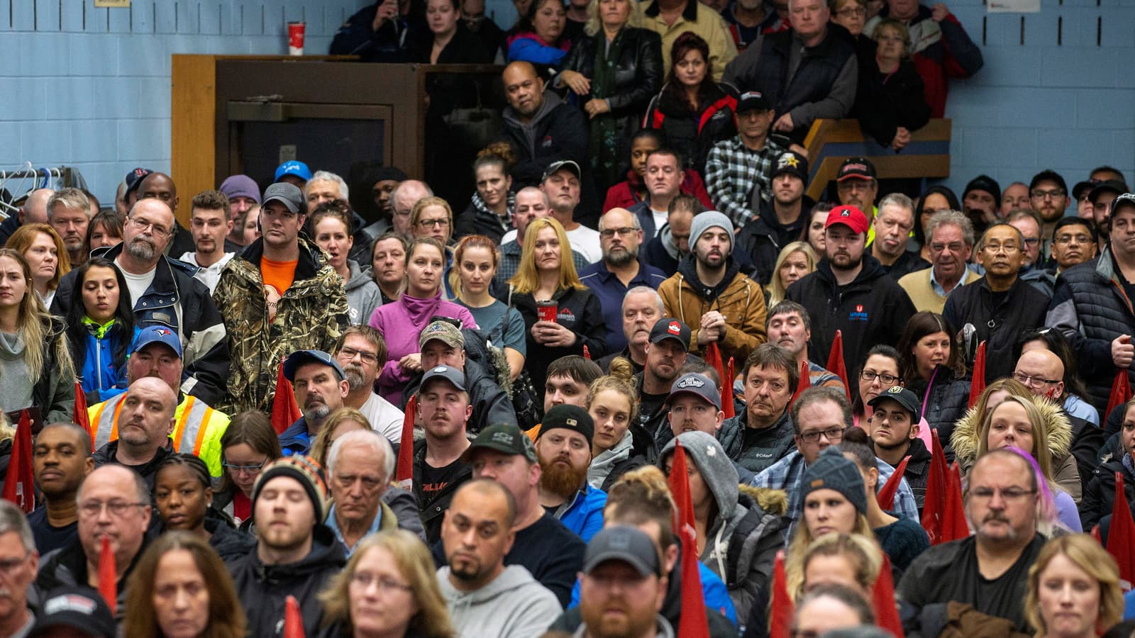 A packed meeting of GM workers at UNIFOR Local 222 in Oshawa, Ontario.