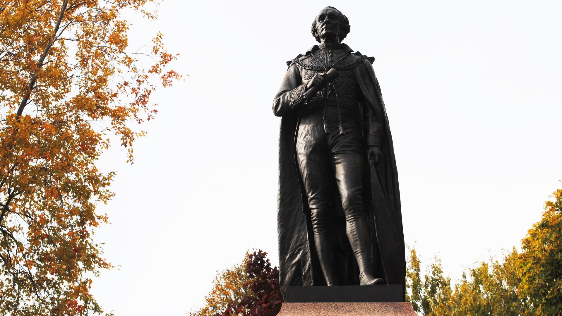 John A. Macdonald's statue against a grey sky