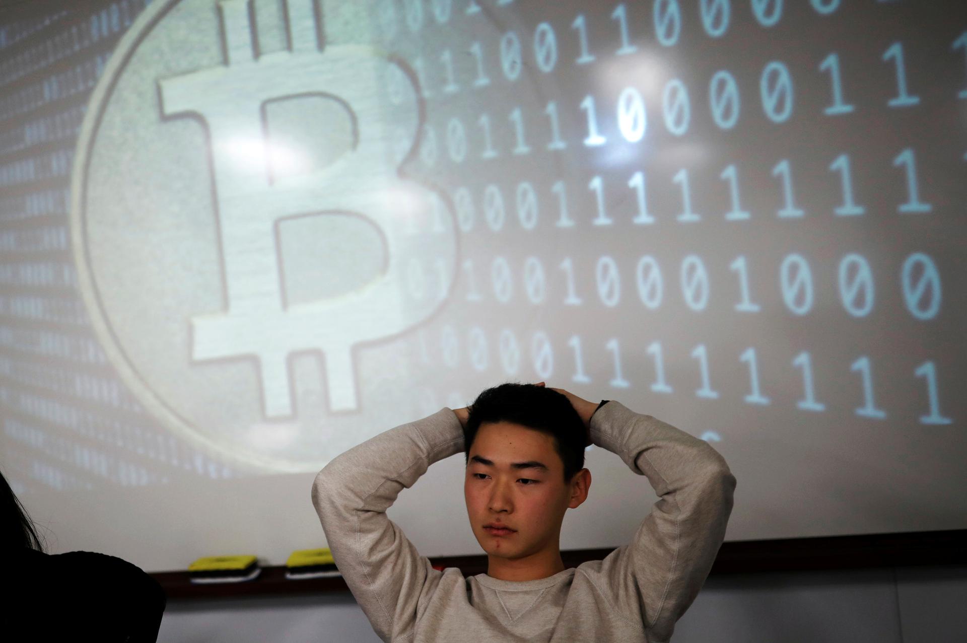 A university student, a member of a club studying cryptocurrencies, attends a meeting at a university in Seoul, South Korea, December 20, 2017.