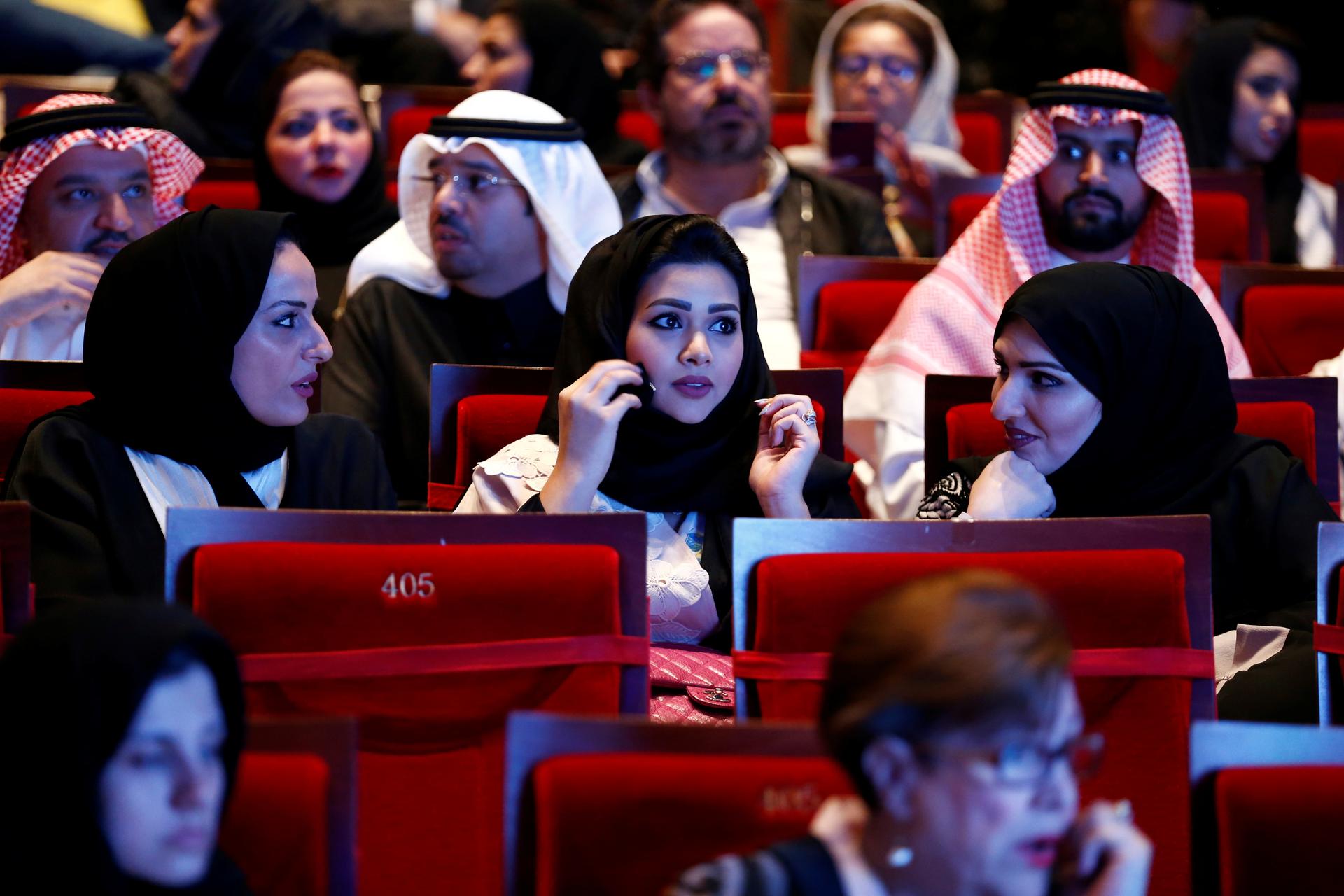 Saudi women attend a concert featuring the Greek perfomer Yanni at Princess Nourah bint Abdulrahman University in Riyadh, Saudi Arabia on December 3, 2017. 