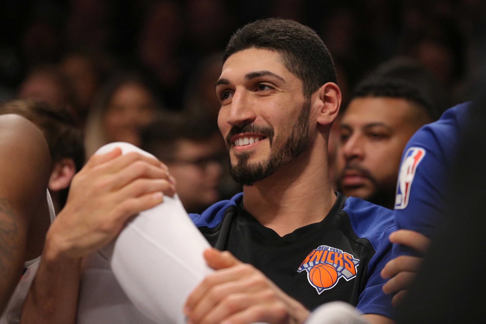 A close up of Enes Kanter's face as he looks to the left