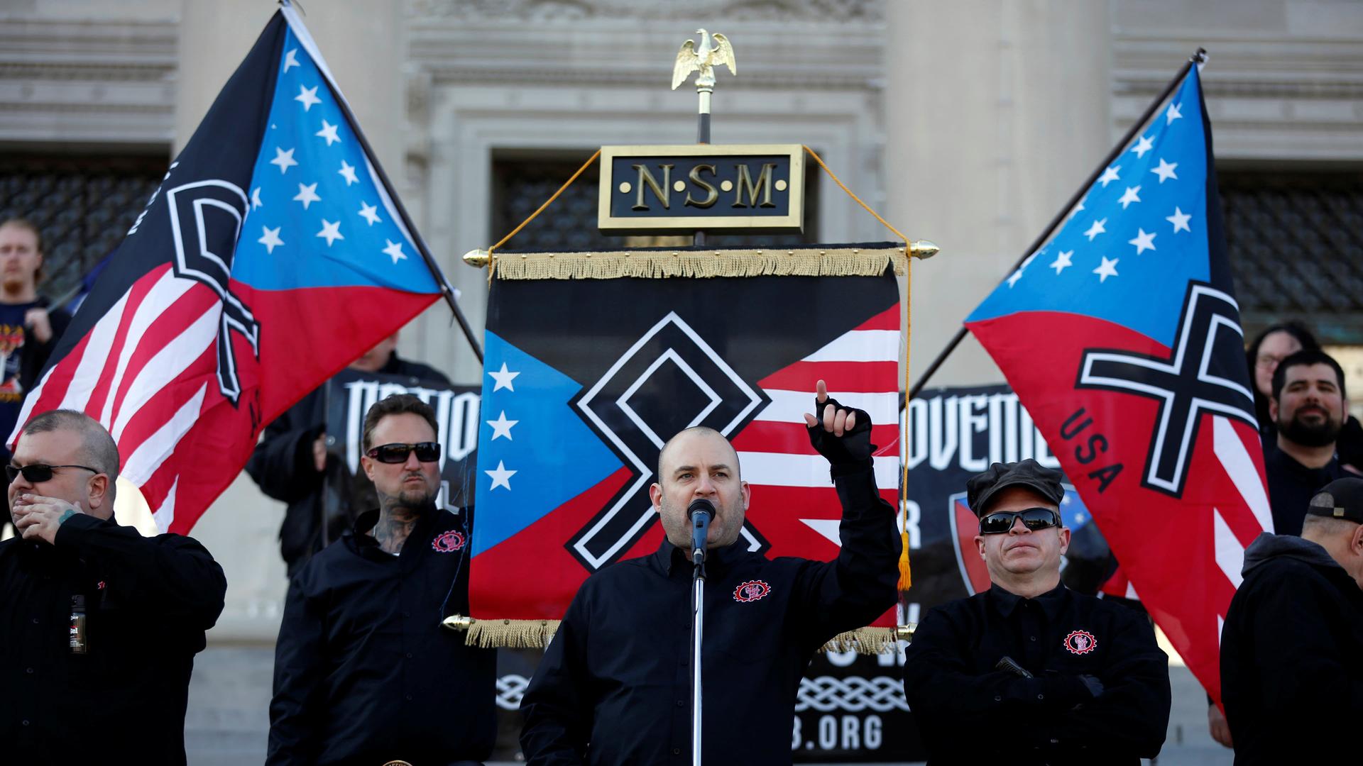 Commander Jeff Schoep of the National Socialist Movement, one of the largest white nationalist type groups in the country, speaks during a rally at the state capital in Little Rock, Arkansas,
