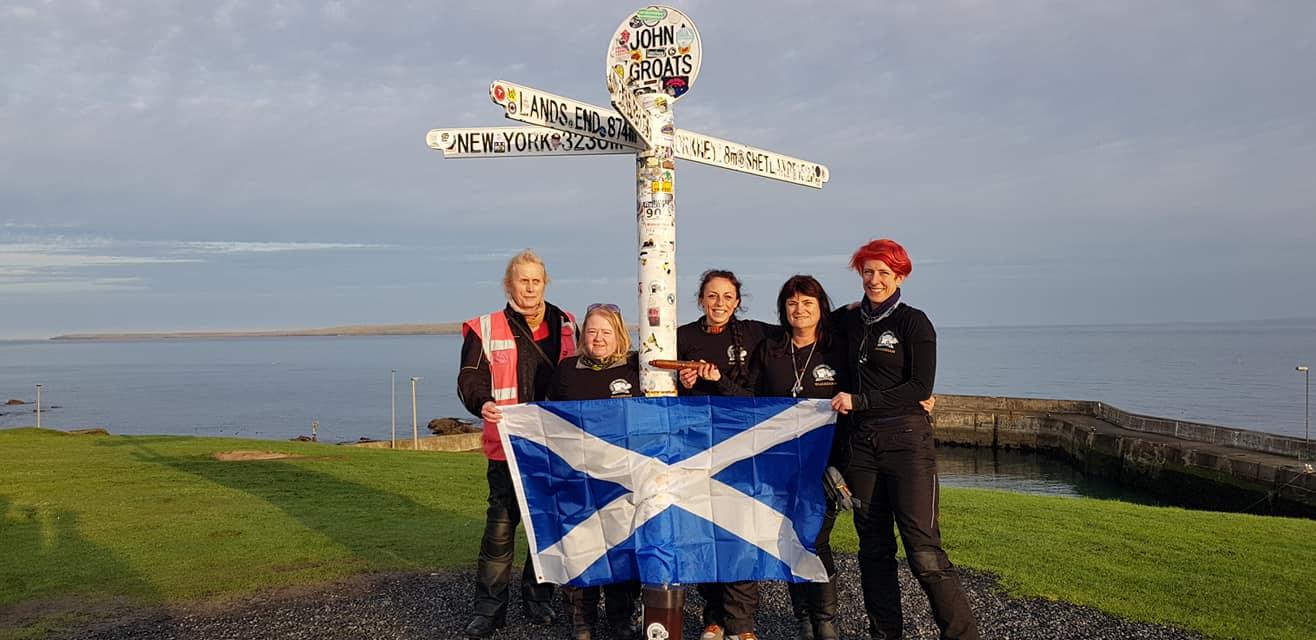 Hayley Bell (third from right), Colette Edeling (second from right) and other riders in John O’Groats, Scotland, the starting point of the relay.