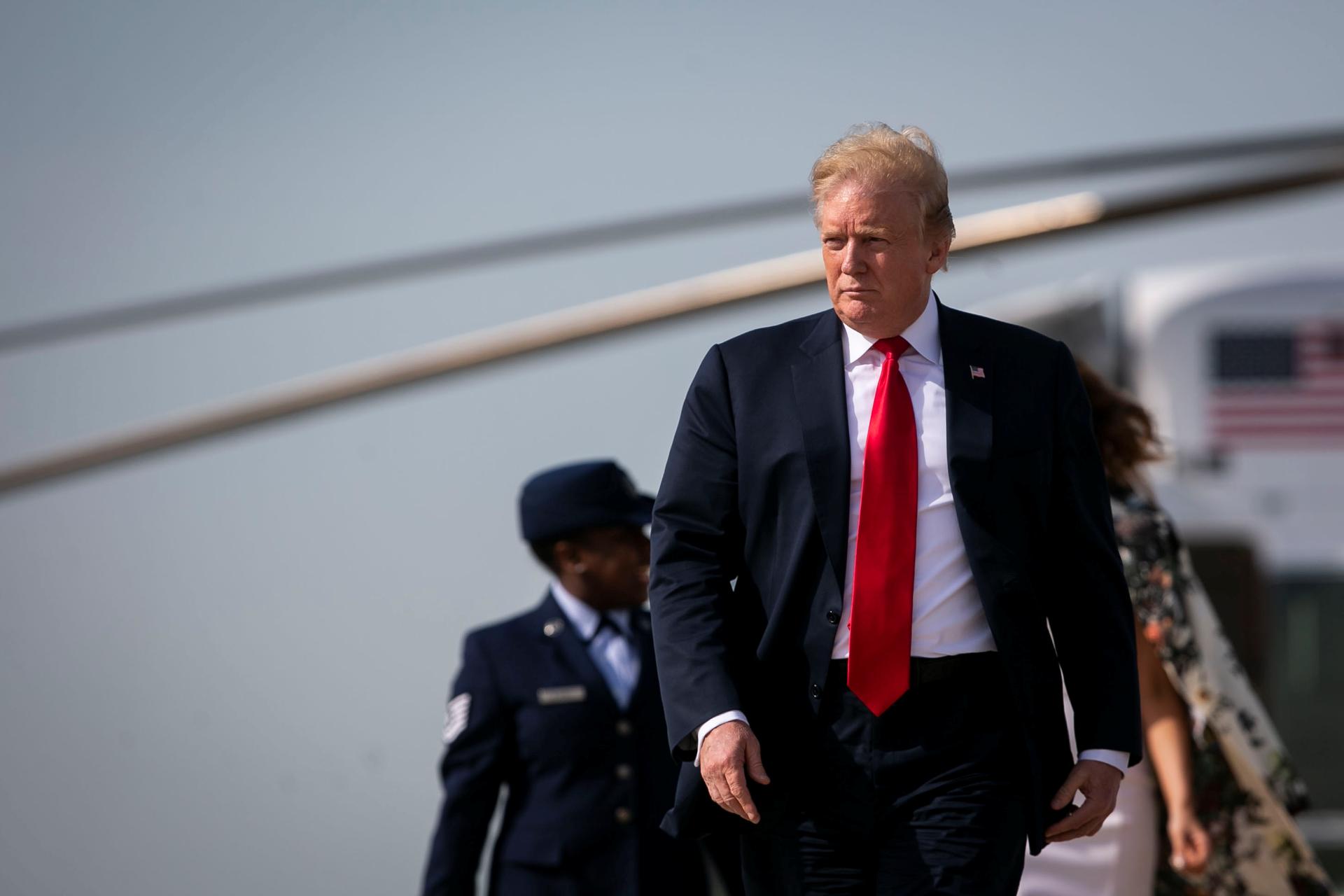 US President Donald Trump walks to board Air Force One as he travesl to Florida for Easter weekend, at Joint Base Andrews in Maryland, April 18, 2019.