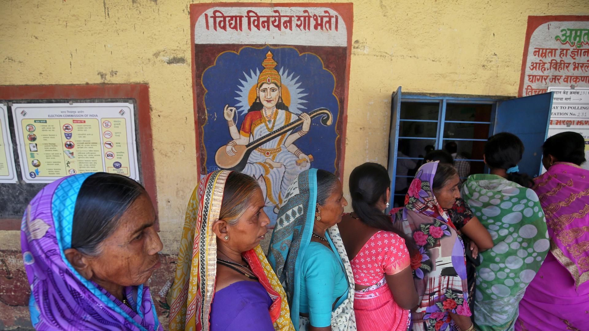 women line up to vote in india