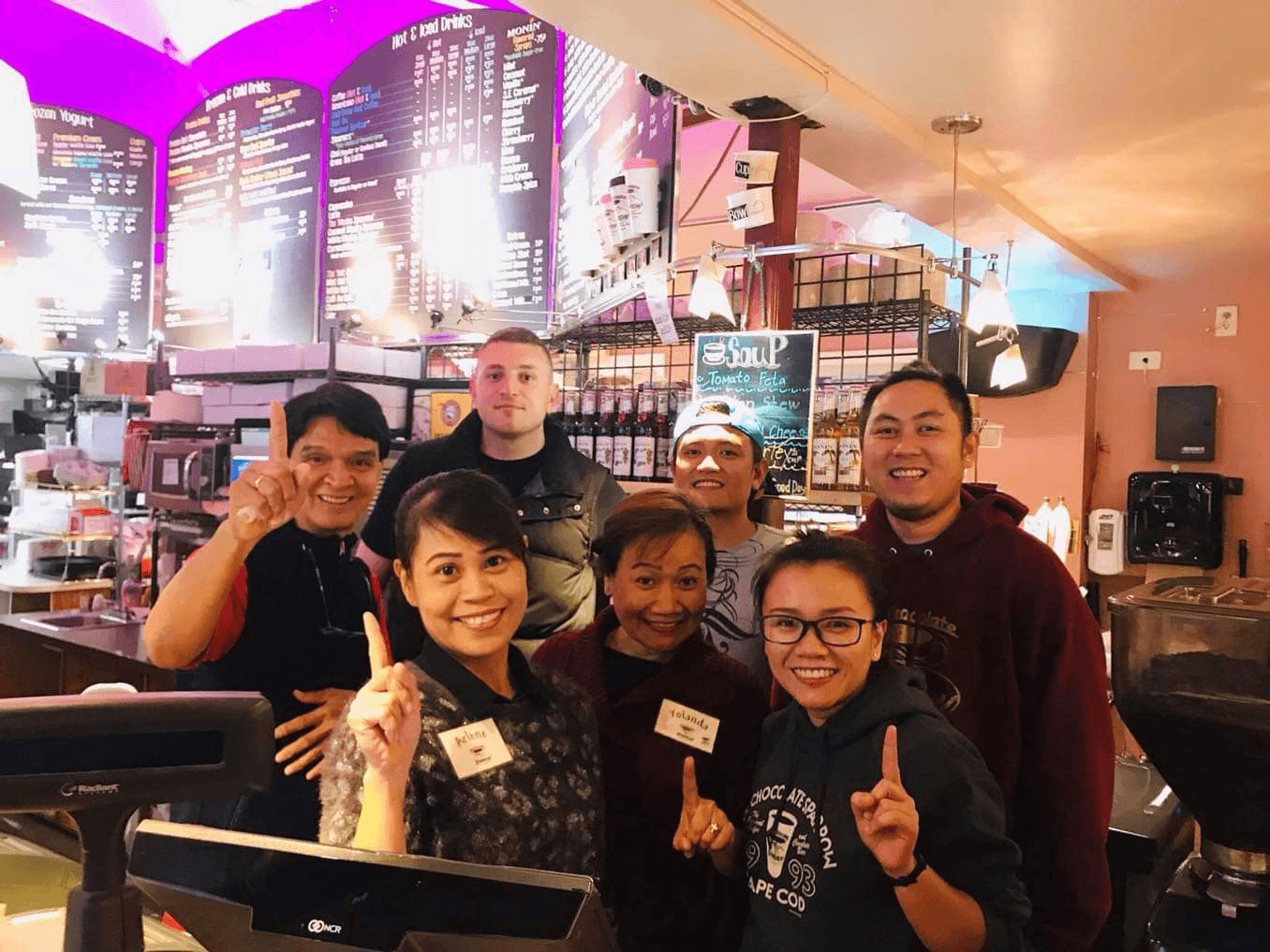 The Tamayo family with their summertime employer, Perry Sparrow at the Hot Chocolate Sparrow coffee shop on Cape Cod. Sparrow may be facing a summer without his regular employees and said, “It's more than just losing workers. All the customers know them h