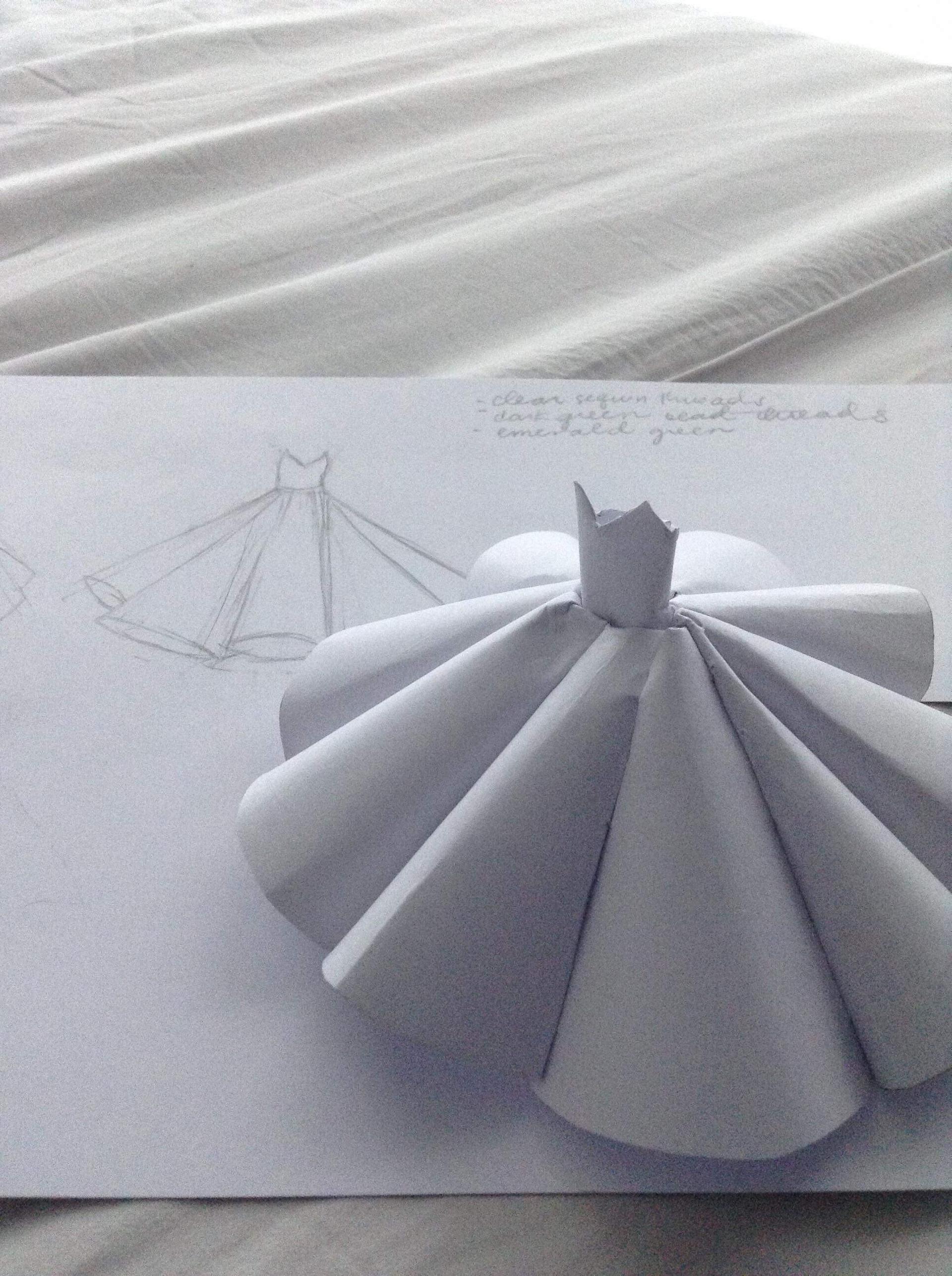 model of a gown made of white paper.