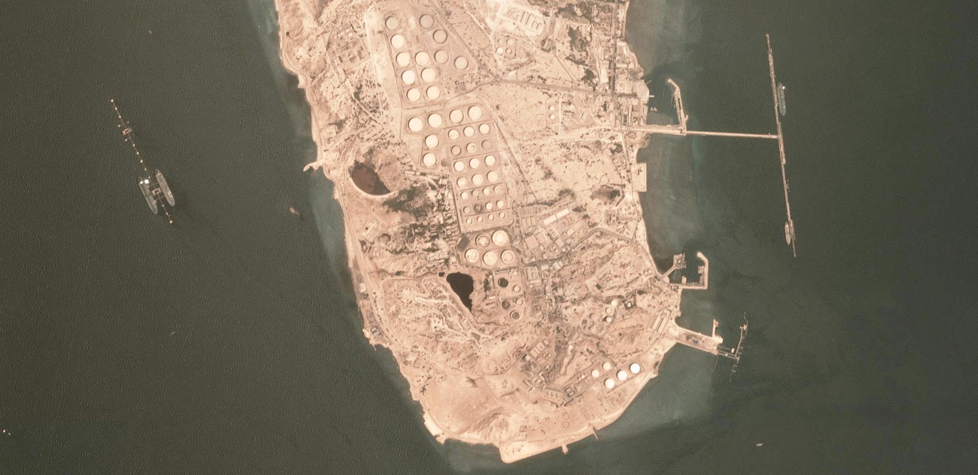 Satellite view of the Kharg Island oil export terminal in Iran. Very Large Crude Carriers  — "supertankers" — can be seen loading on the sides.