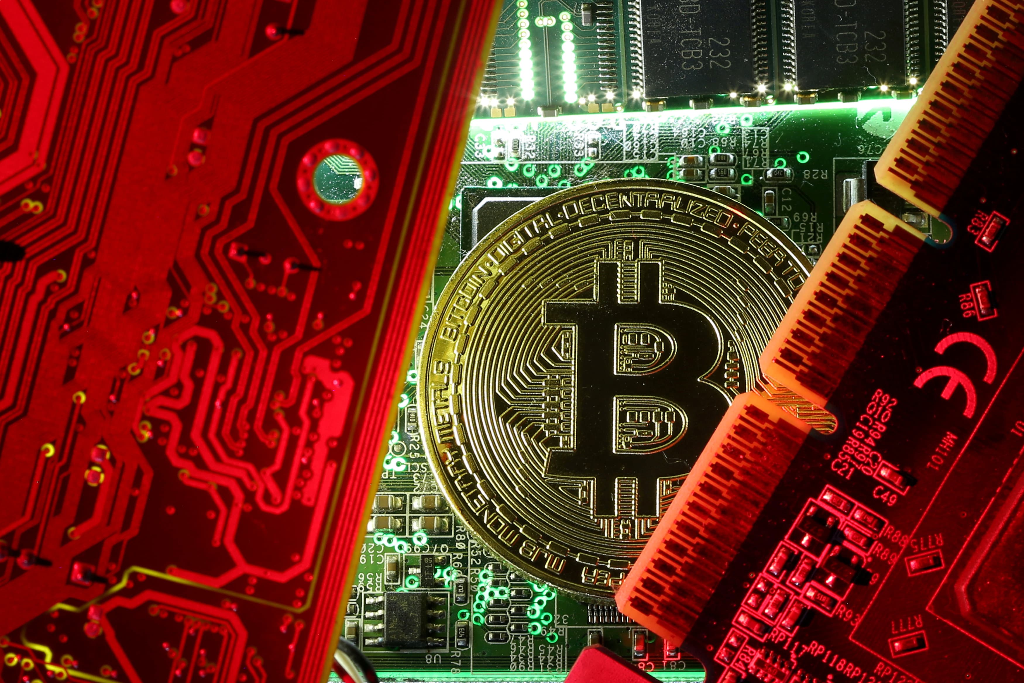 A bitcoin on a computer motherboard