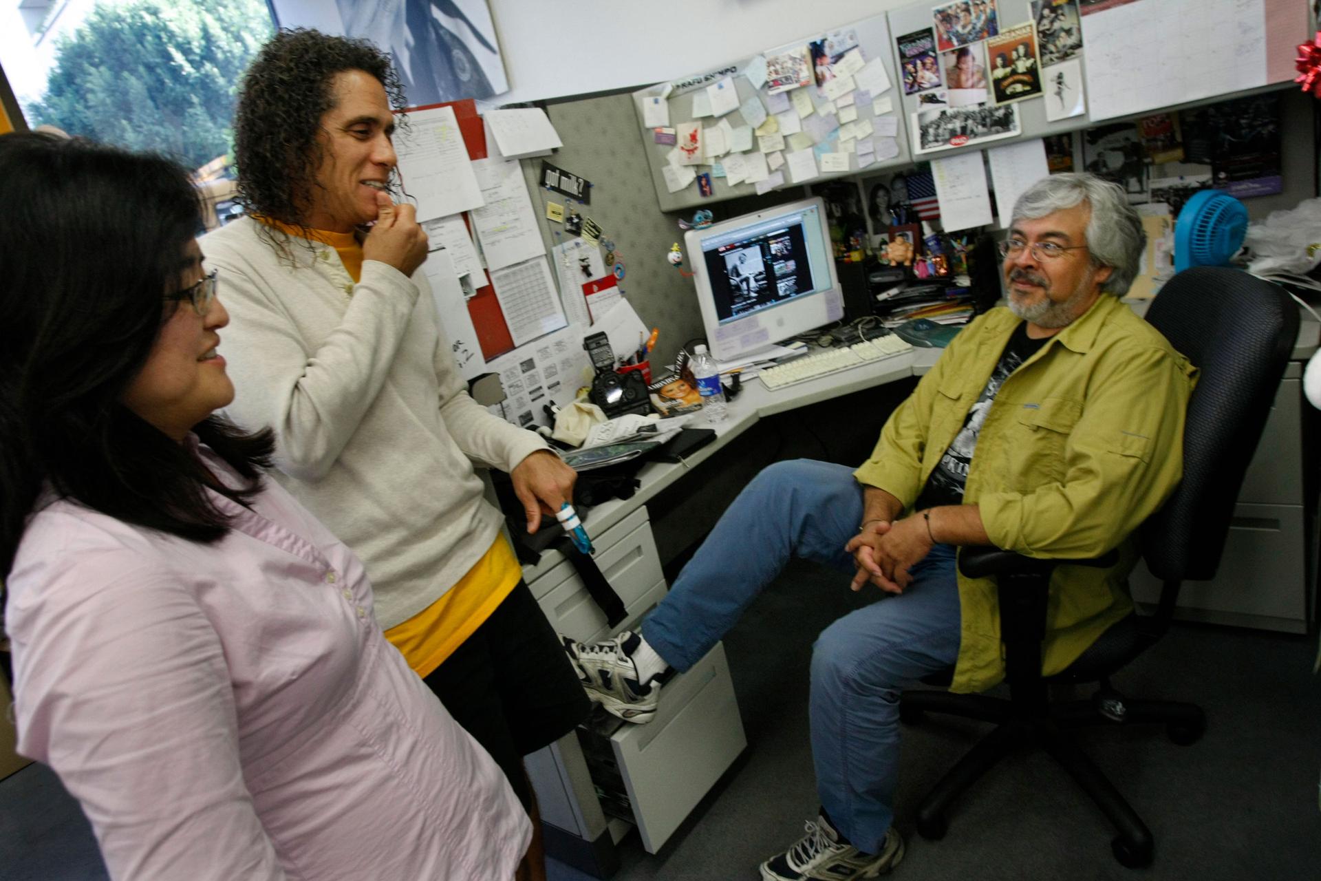 (Left to right) Gwen Muranaka, Mikey Hirano Culross and Mario Reyes, in the newsroom of the last remaining Japanese American daily newspaper, the Rafu Shimpo in downtown Los Angeles, 2010.