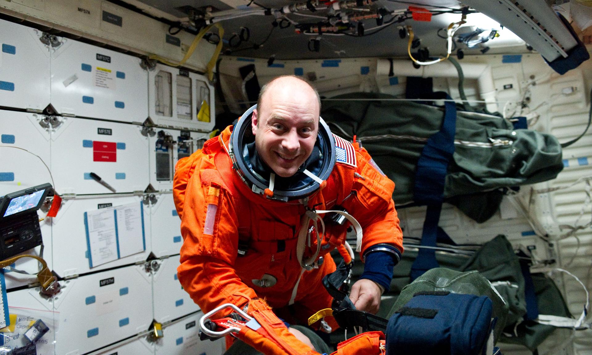 NASA astronaut Garrett Reisman on the middeck of the space shuttle Atlantis in 2010.