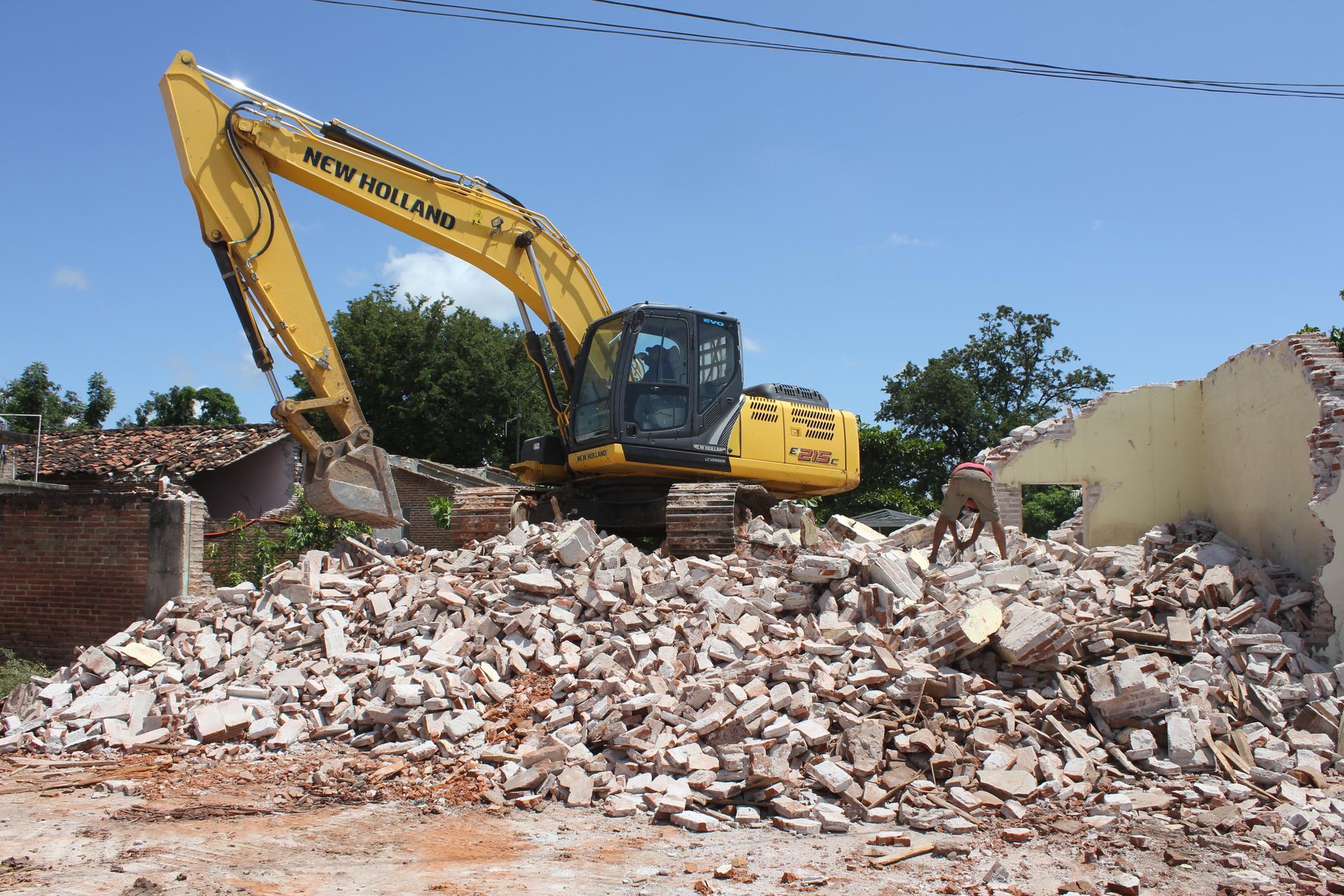 Demolition crews have been knocking down homes by the hundreds across Oaxaca's Isthmus region. Many homeowner say they feel rushed into the tear-downs.