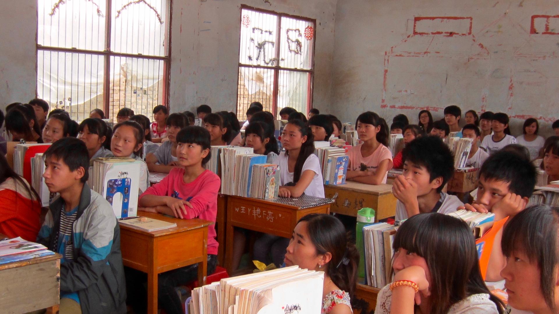 Students sit through class in a rural Chinese school. American writer Lenora Chu's new book is called "Little Soldiers: An American Boy, A Chinese School, and the Global Race to Achieve."