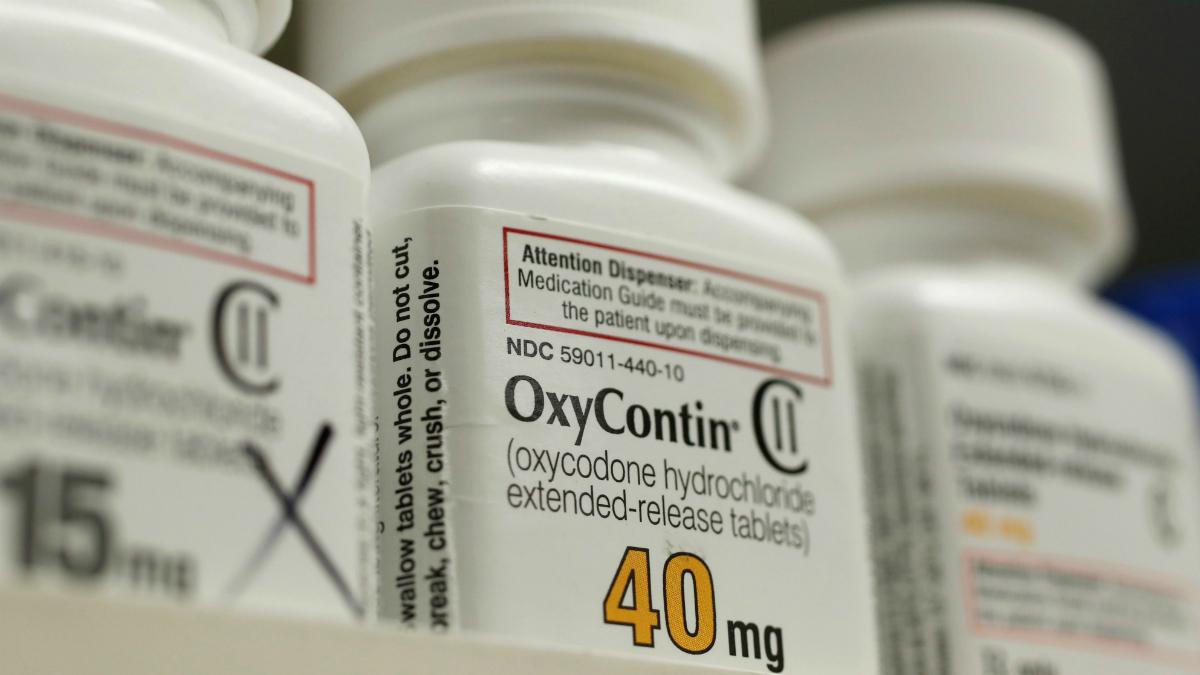 Bottles of prescription painkiller OxyContin, 40mg pills, made by Purdue Pharma L.D. sit on a shelf at a local pharmacy, in Provo, Utah, U.S., April 25, 2017.