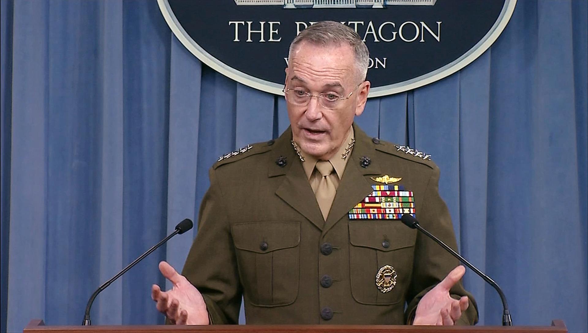 US Joint Chiefs of Staff Chairman General Joseph Dunford is stands at a podium during a press conference.