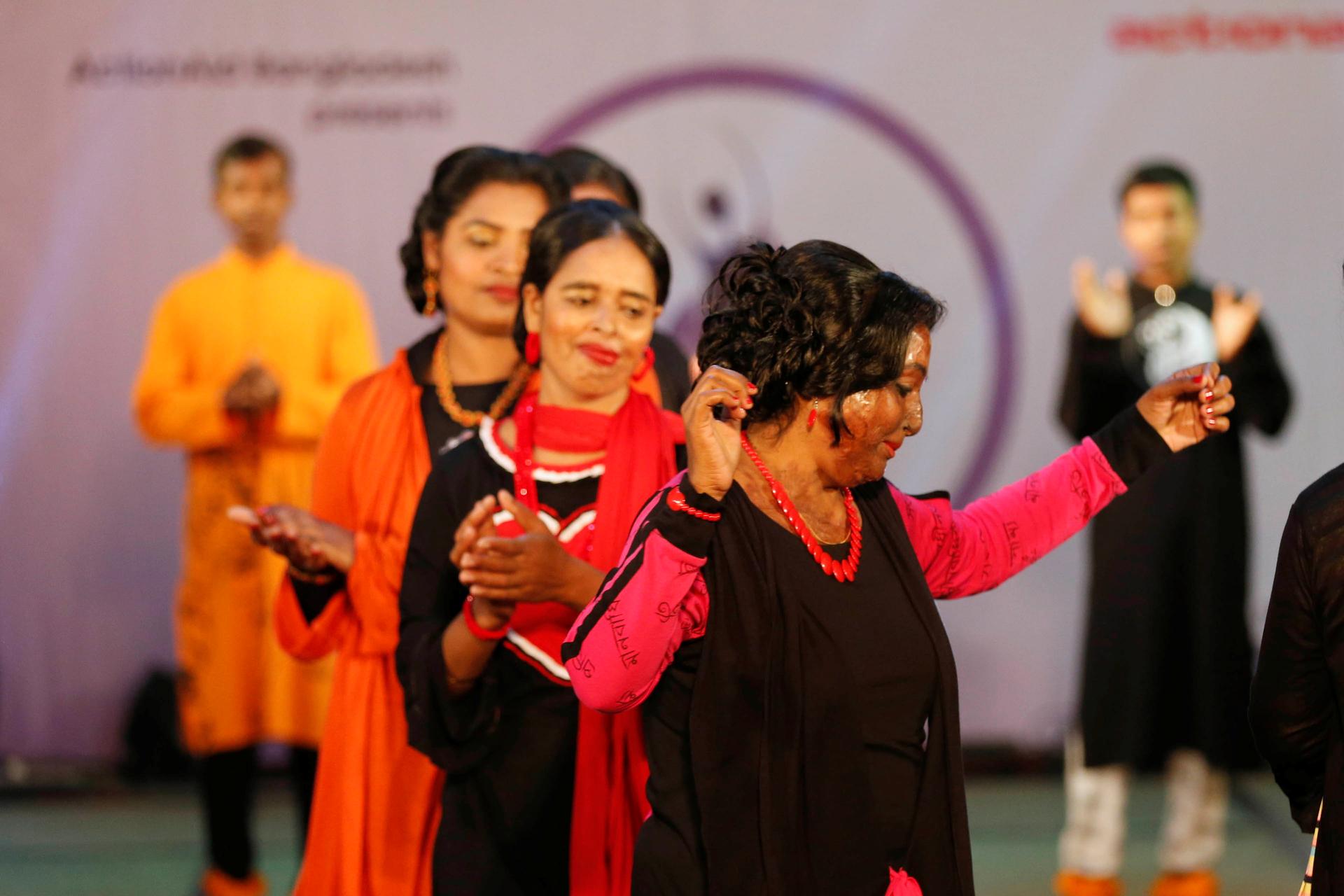 Acid attack survivors walk on the ramp as they participate in a fashion show titled “Beauty Redefined” organized by ActionAid in Bangladesh earlier this year. 