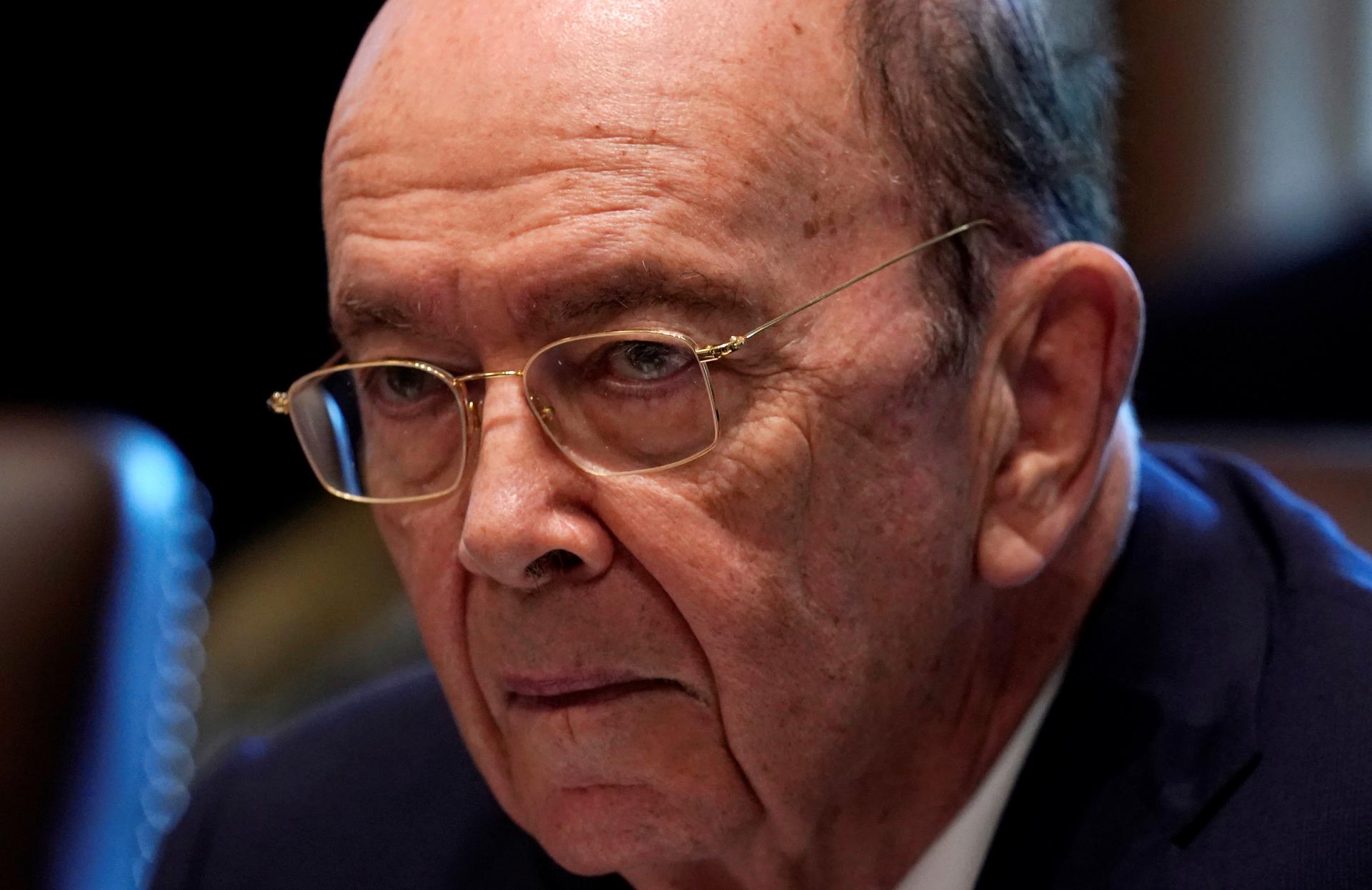 Democrats have called for an inquiry into Commerce Secretary Wilbur Ross's business links to Vladimir Putin's son-in-law. Ross denies wrongdoing.