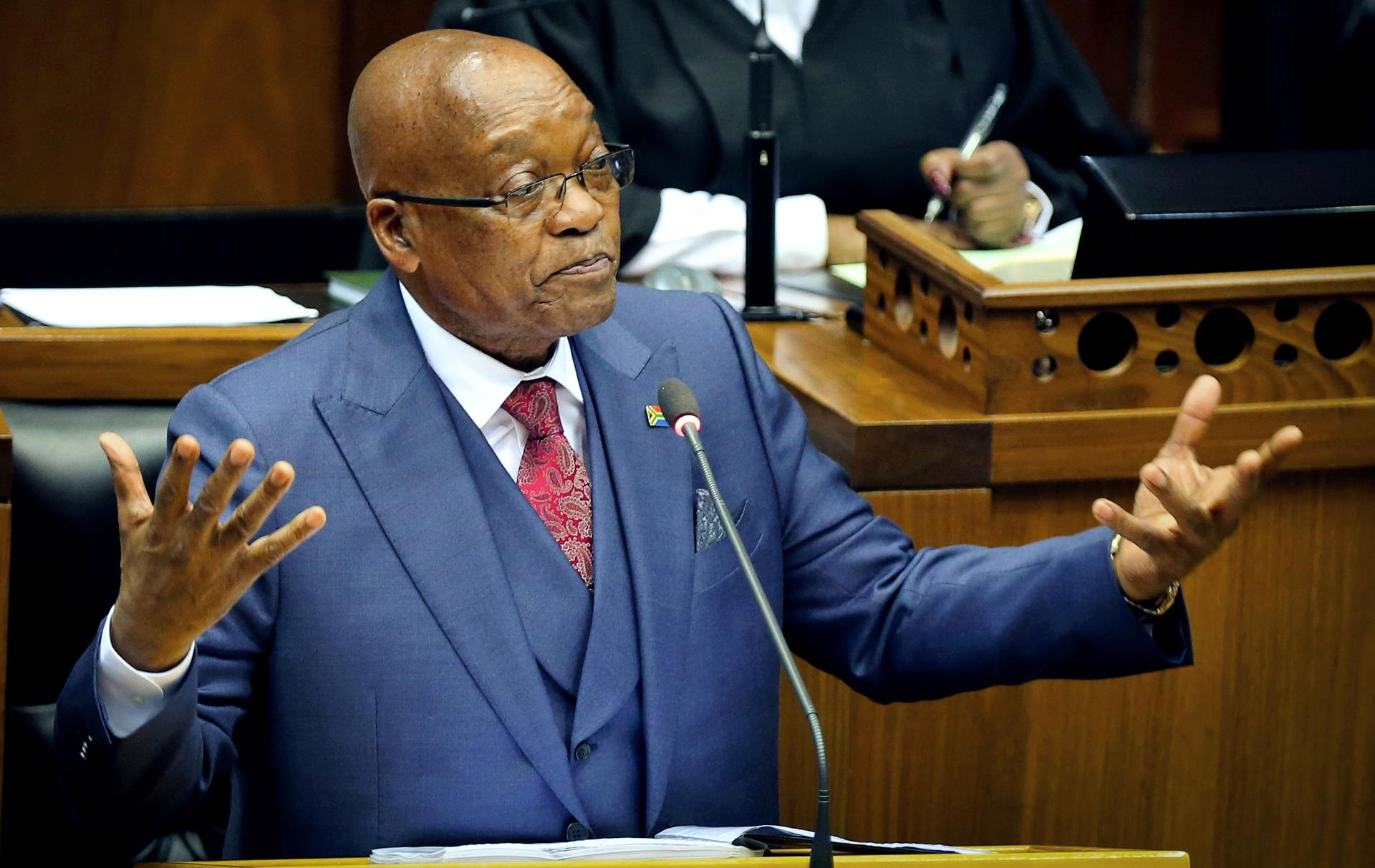 President Jacob Zuma gestures as he addresses parliament in Cape Town.