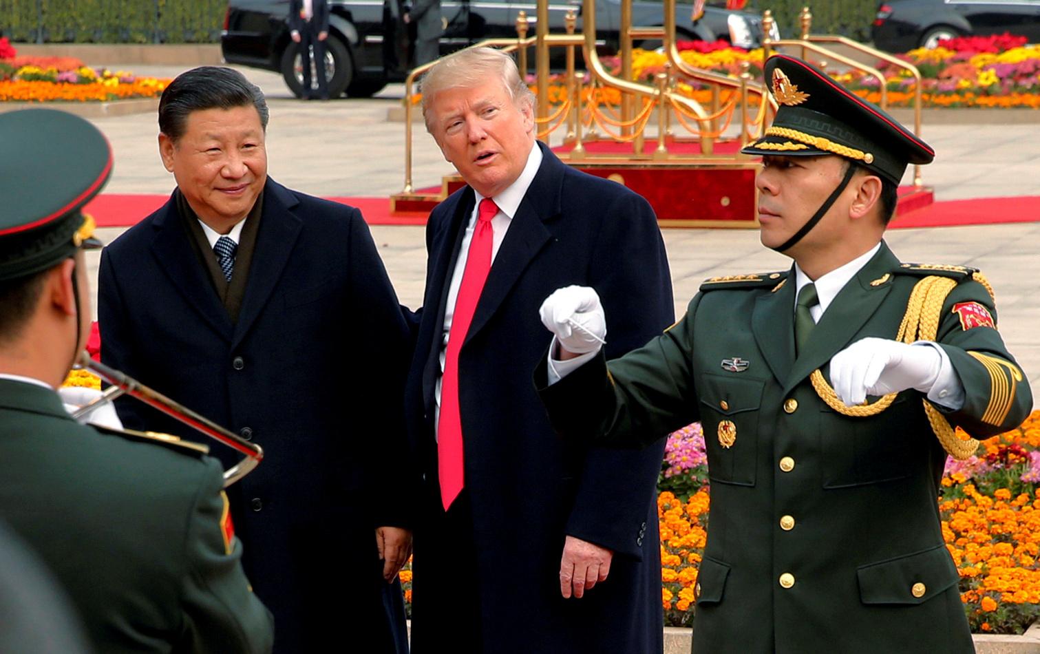 U.S. President Donald Trump takes part in a welcoming ceremony with China's President Xi Jinping in Beijing, China, November 9, 2017.