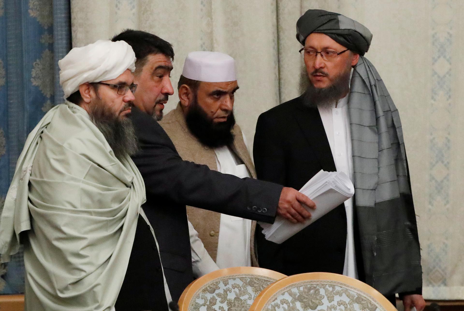 Members of the Taliban delegation take their seats during the multilateral peace talks on Afghanistan in Moscow, Russia November 9, 2018.