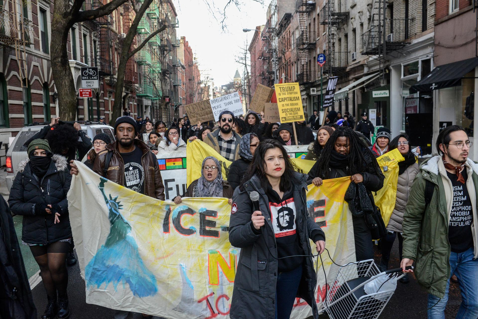 People participate in a protest against U.S. President Donald Trump's immigration policy and the recent Immigration and Customs Enforcement (ICE) raids in New York City, U.S. February 11, 2017. 