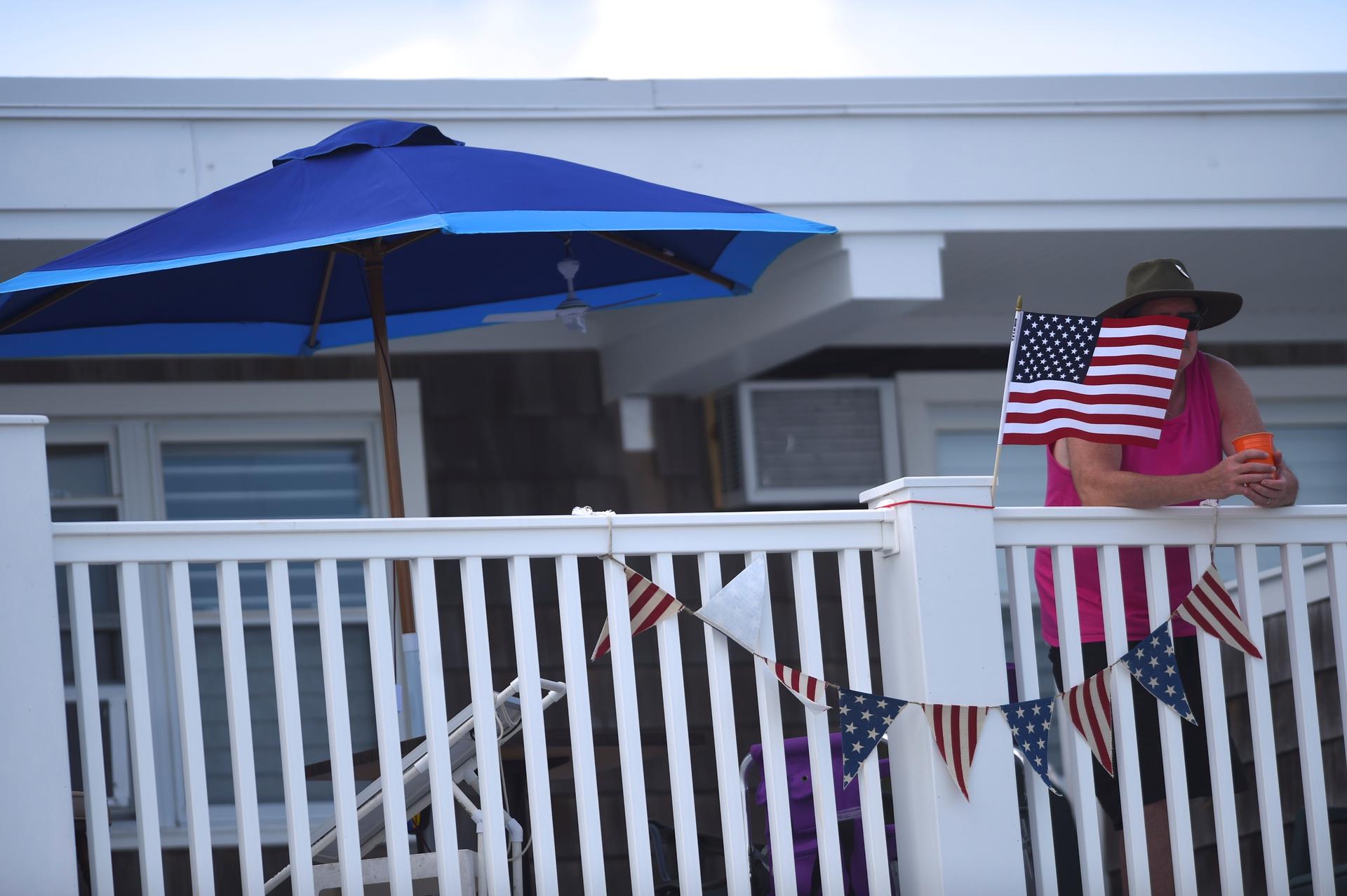 A U.S. flag and patriotic bunting is displayed on a beachside motel in New Jersey. 