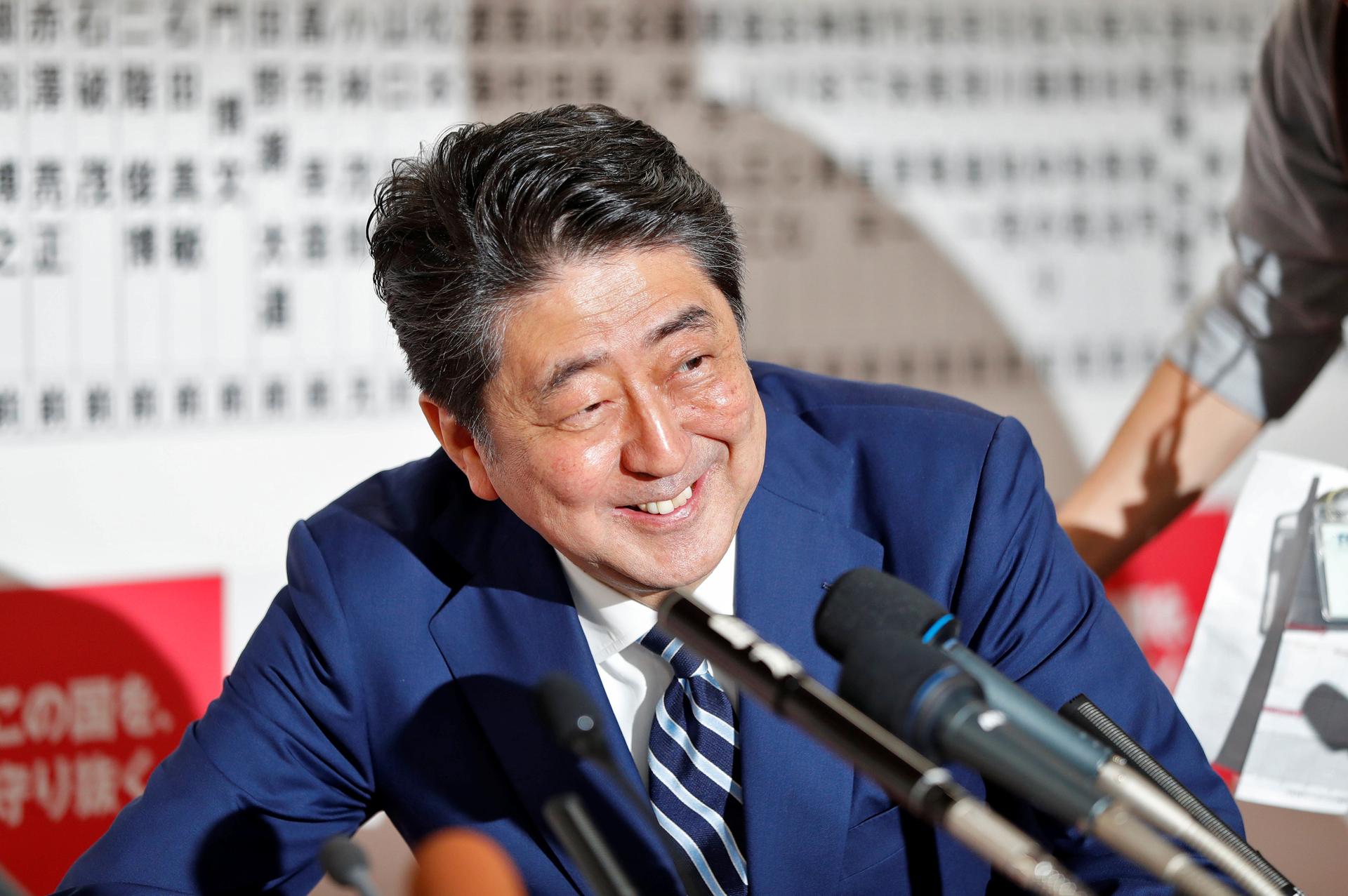 Japan's Prime Minister Shinzo Abe, leader of the Liberal Democratic Party, smiles during a news conference after Japan’s lower house election, at the LDP headquarters in Tokyo, Japan, Oct. 22, 2017.
