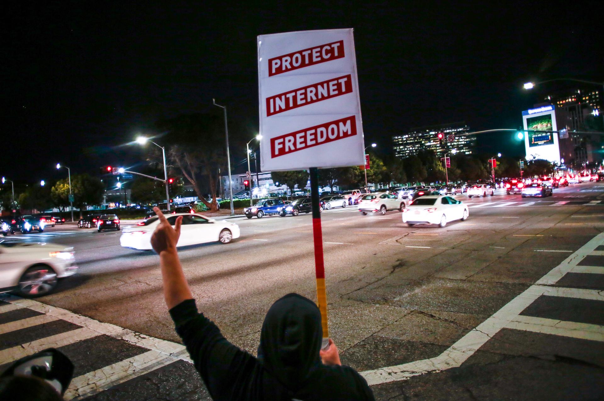 Supporter of Net Neutrality Lance Brown Eyes protests the FCC's recent decision to repeal the program in Los Angeles, California, November 28, 2017.