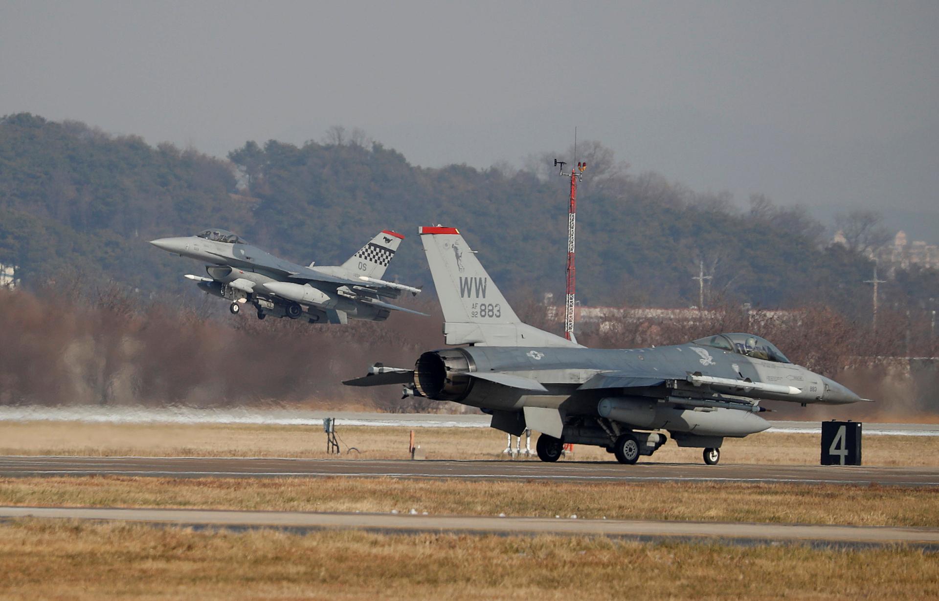 US Air Force F-16 fighter jets take part in a joint aerial drill exercise called "Vigilant Ace" between the US and South Korea