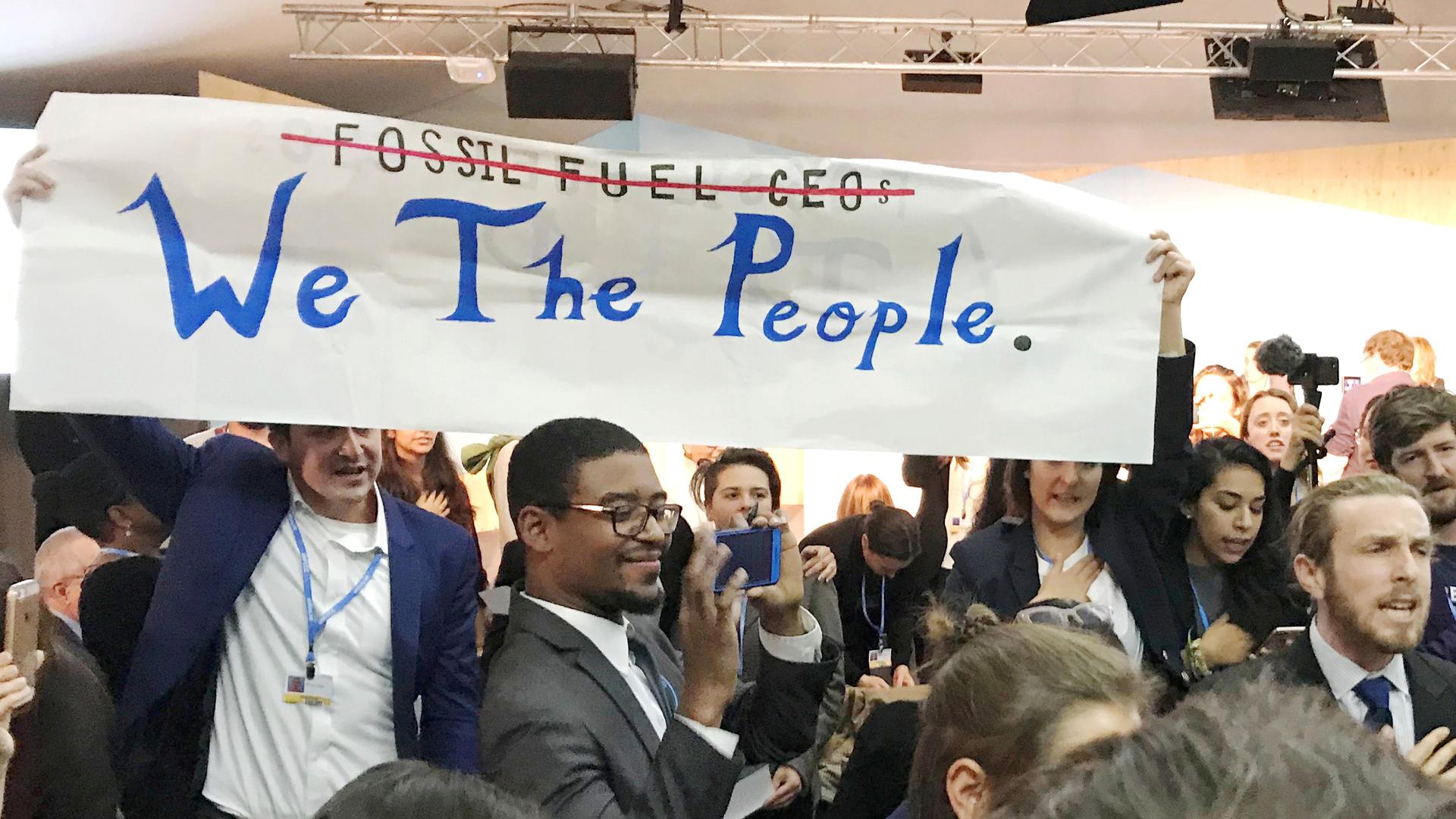 Protesters interrupt a U.S. government pro-coal event during this year's UN Climate Change Conference in Bonn, Germany. 
