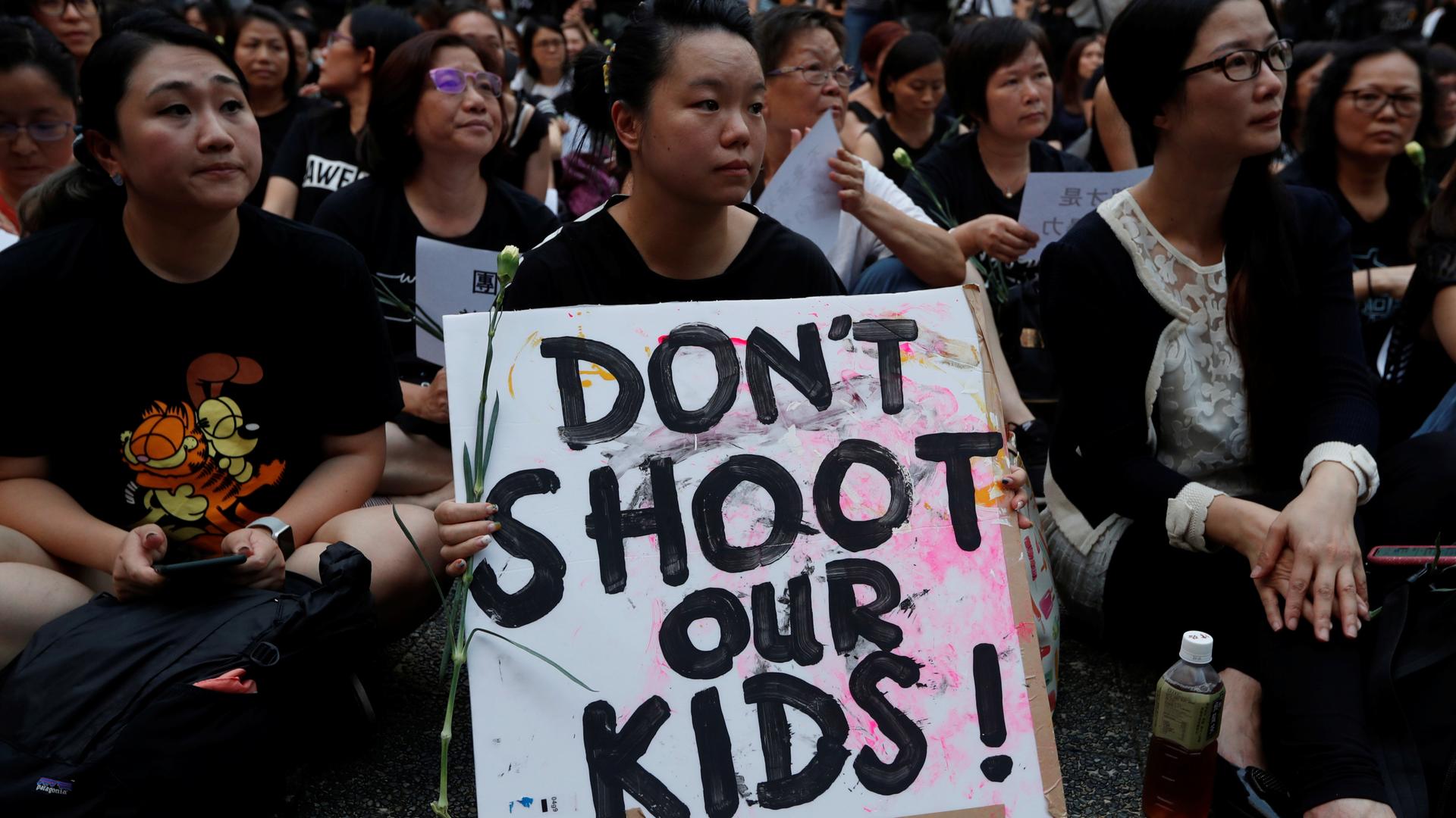 People attend a rally in support of demonstrators protesting against proposed extradition bill with China, in Hong Kong, China, June 14, 2019.