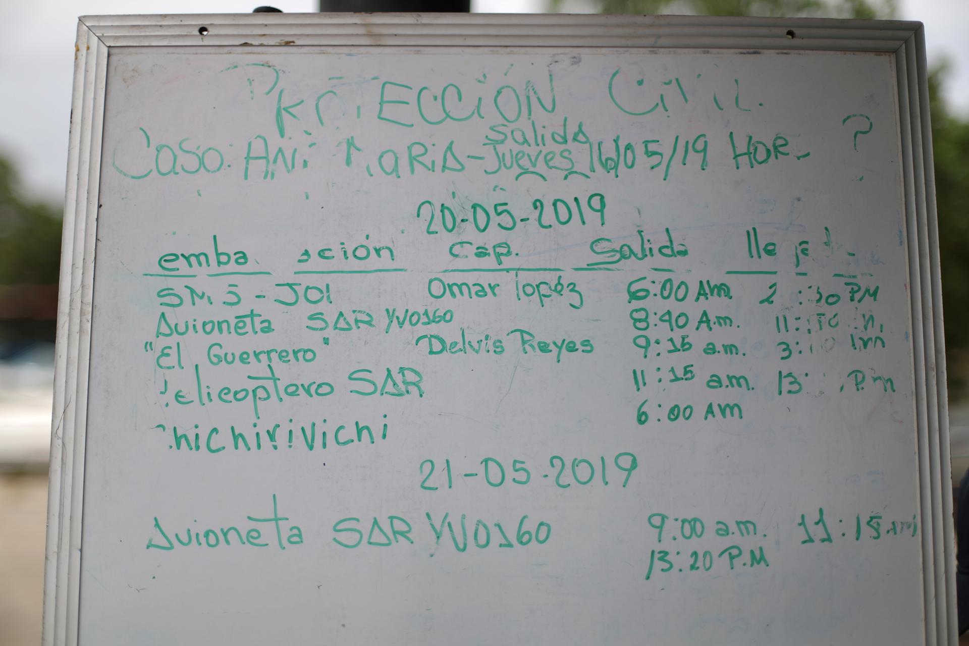 a whiteboard showing search and rescue operations