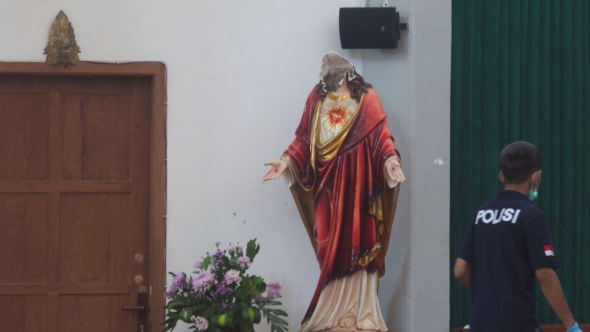 A decapitated religious statue