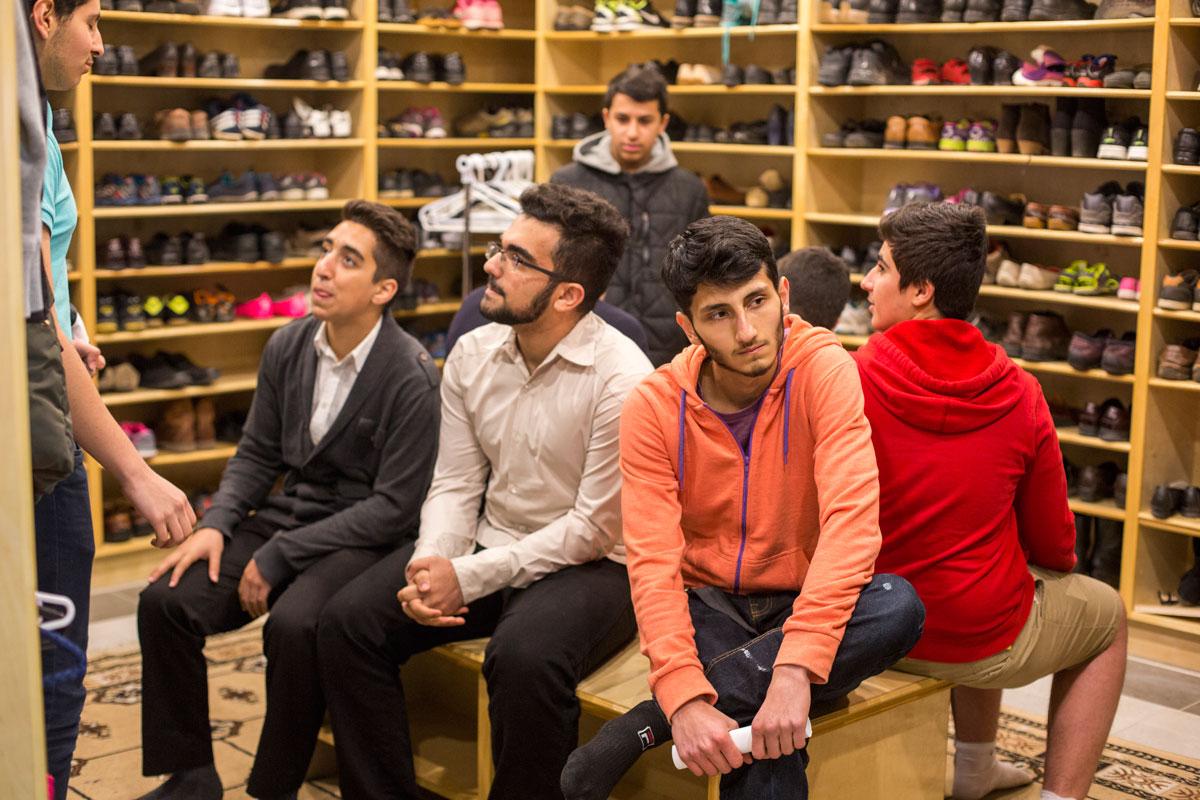 A group of Iranian youth, socializing after practicing their religion in the mosque.