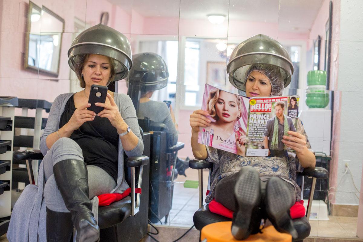 From left to right, Lida Parandakh, and Sara Masarat, both Iranian women living in Toronto at a beauty salon which caters to the Iranian expat community there.