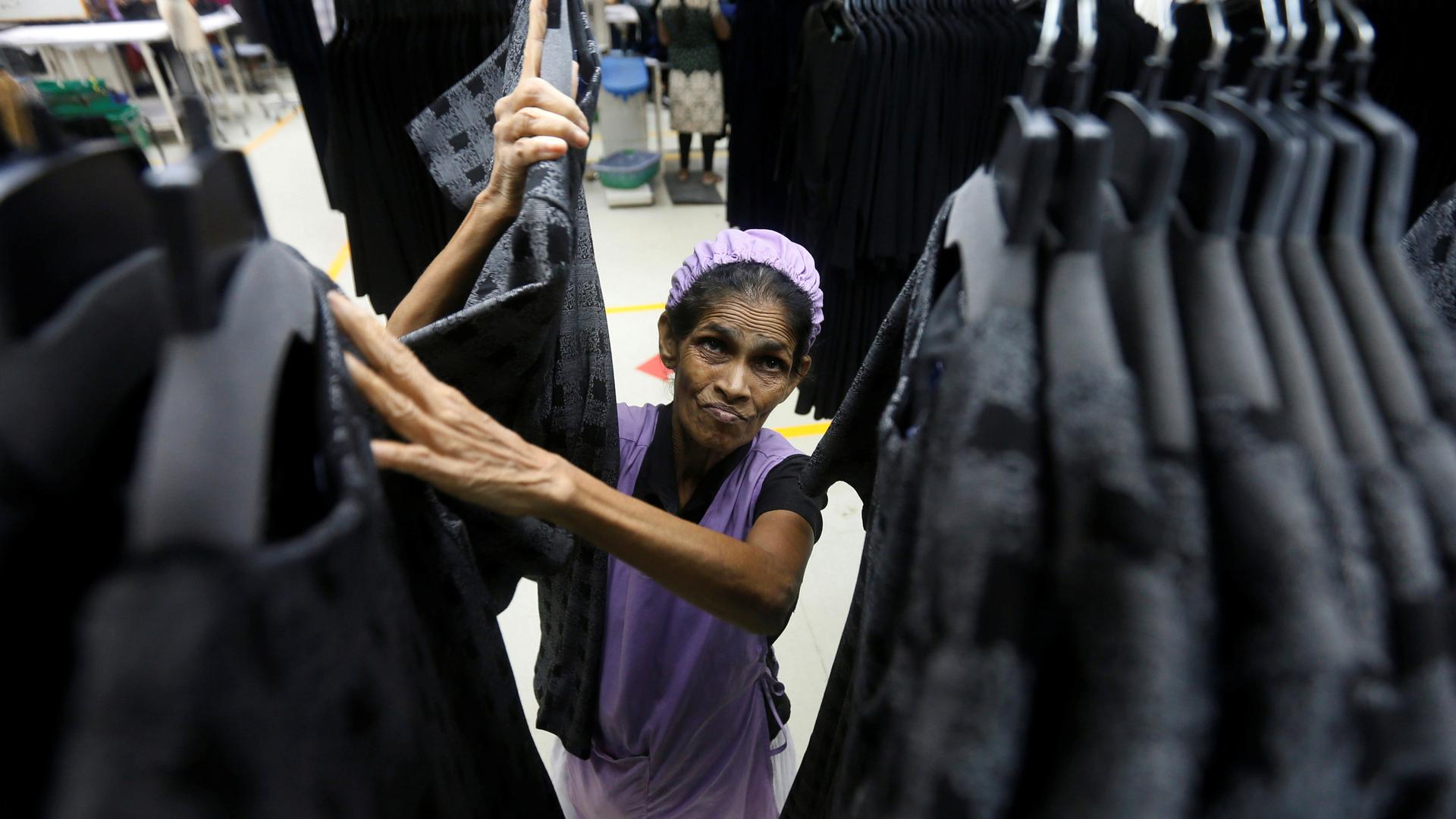 a woman working in a factory in sri lanka