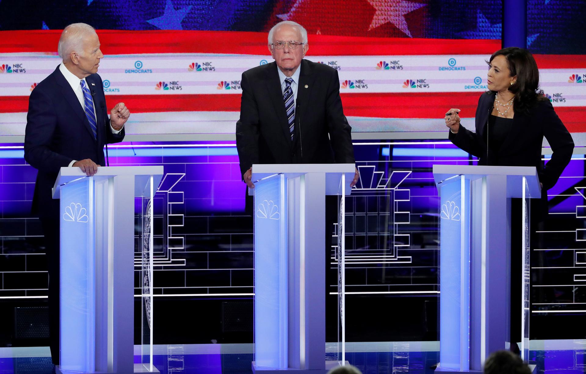 Joe Biden, Bernie Sanders, and Kamala Harris at a Democratic primary debate. 