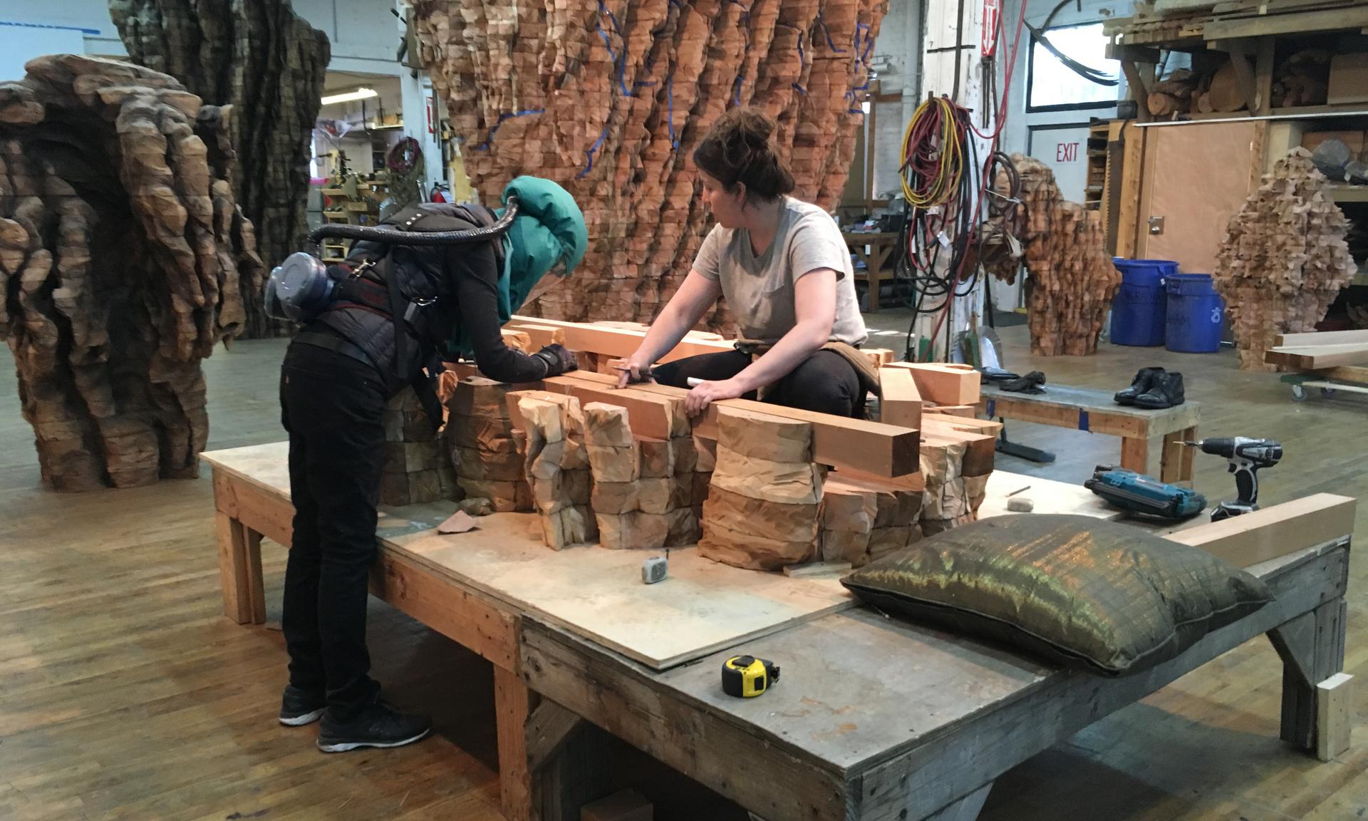 Ursula von Rydingsvard at work in her studio, with assistant Morgan Daly.